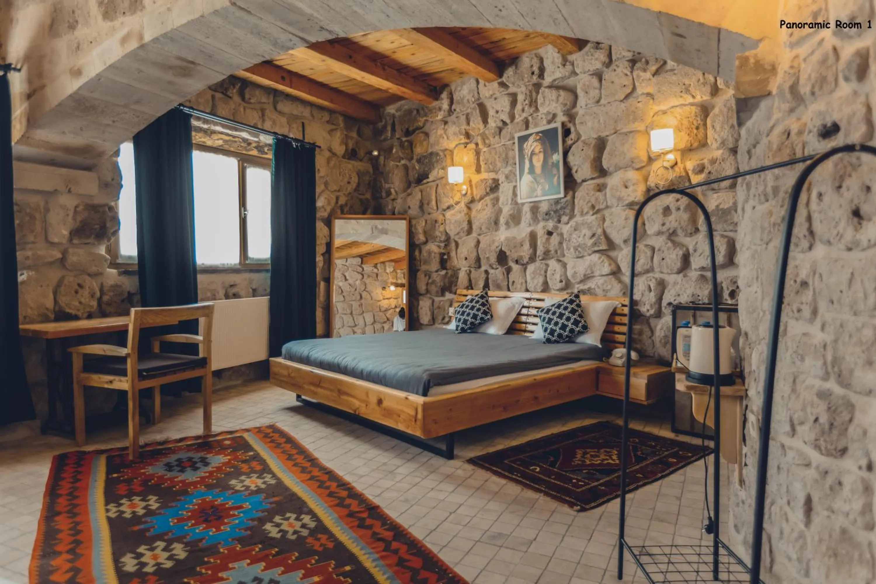 Bed in Pinhan Cave Suites