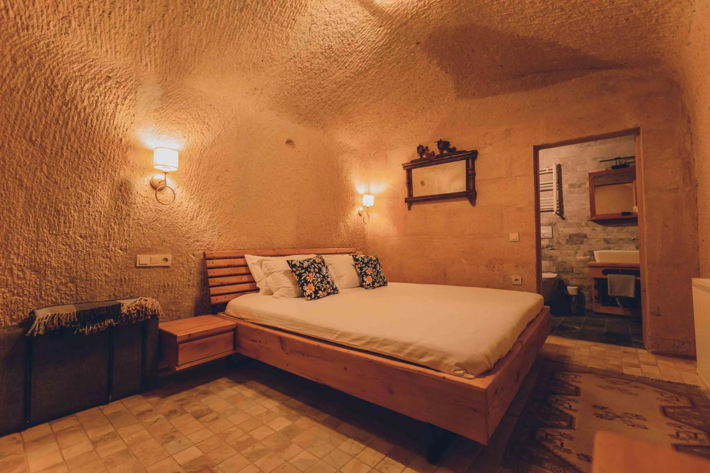Bed in Pinhan Cave Suites