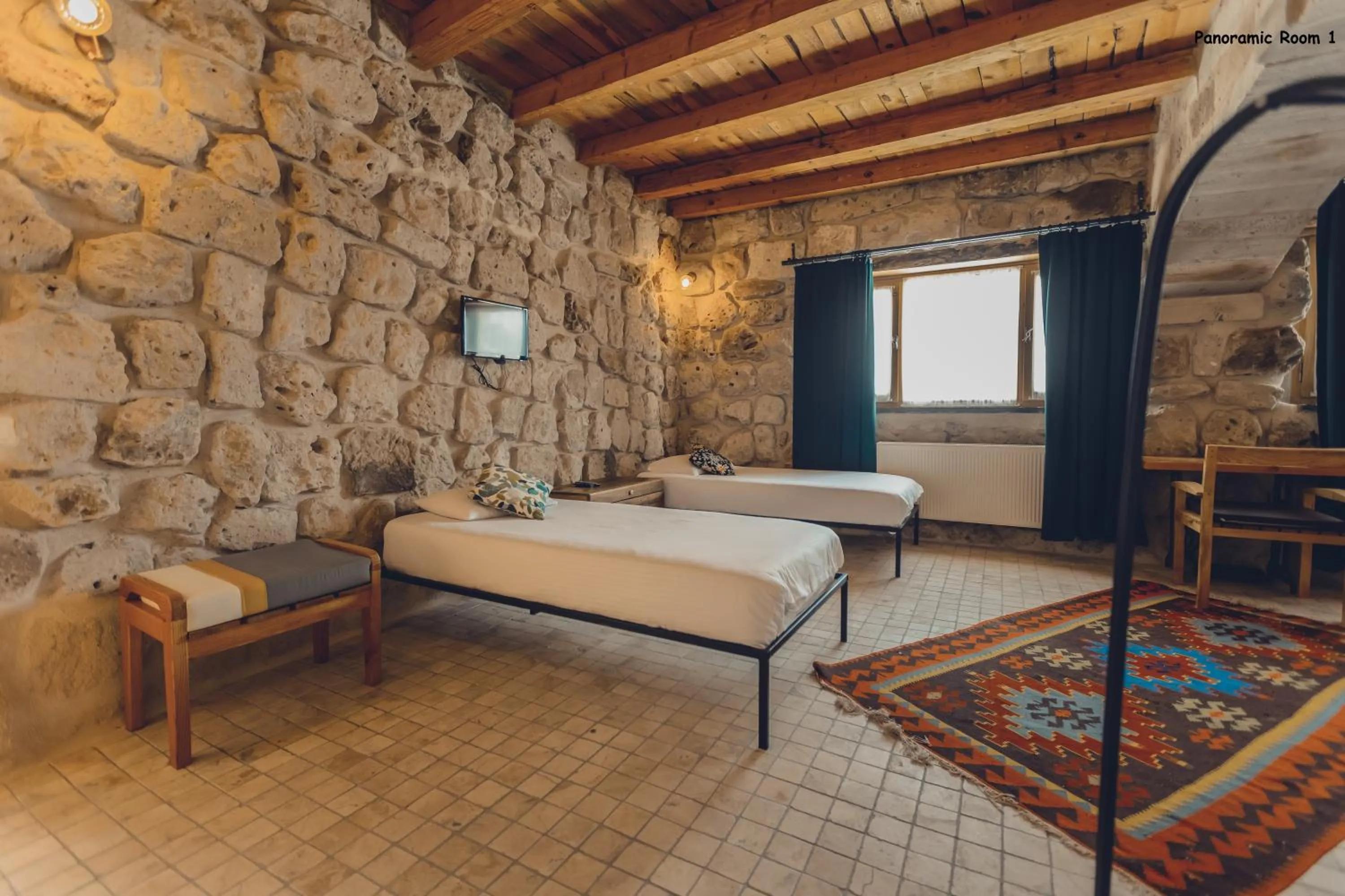Bed in Pinhan Cave Suites