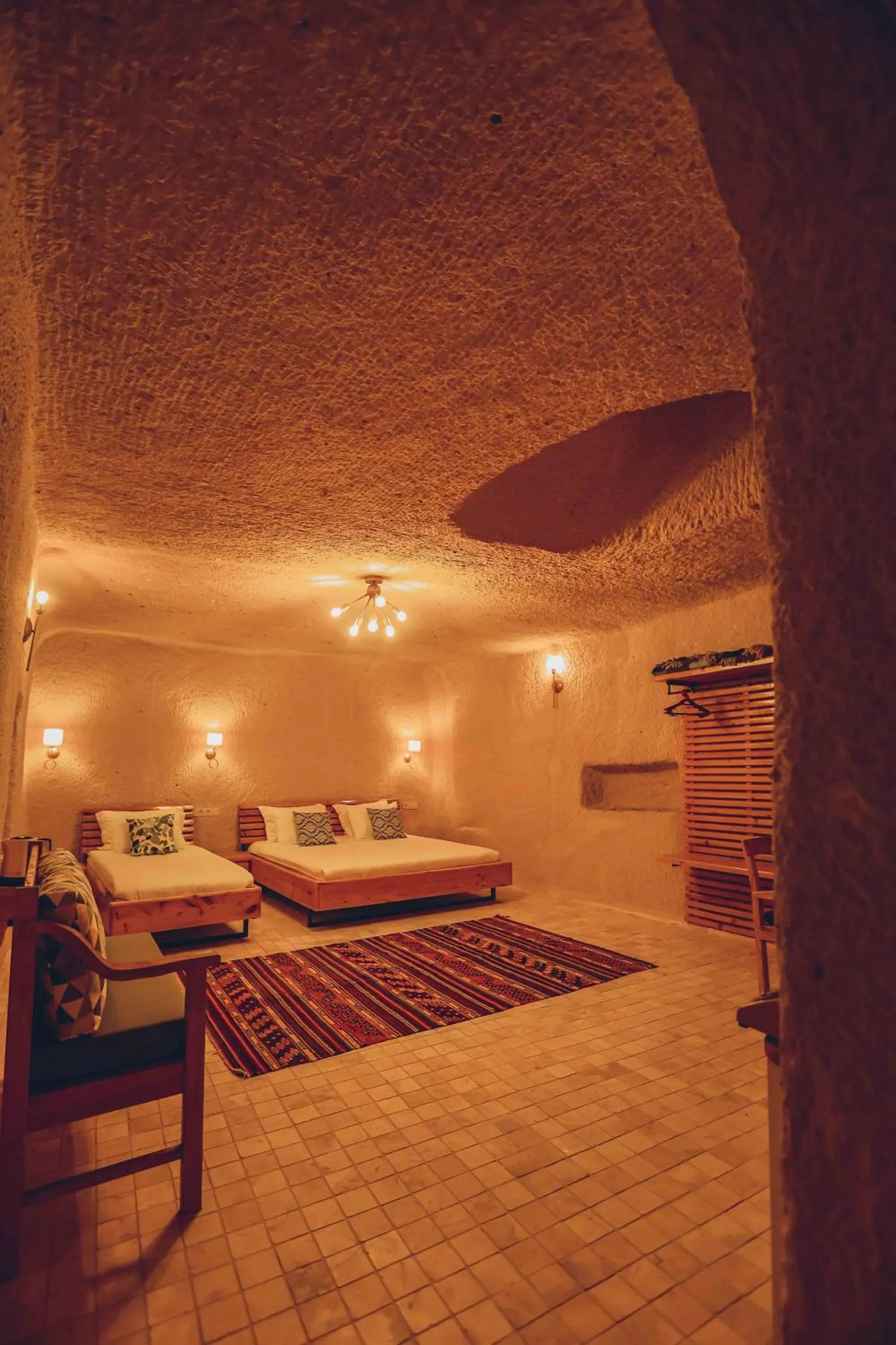Bed in Pinhan Cave Suites