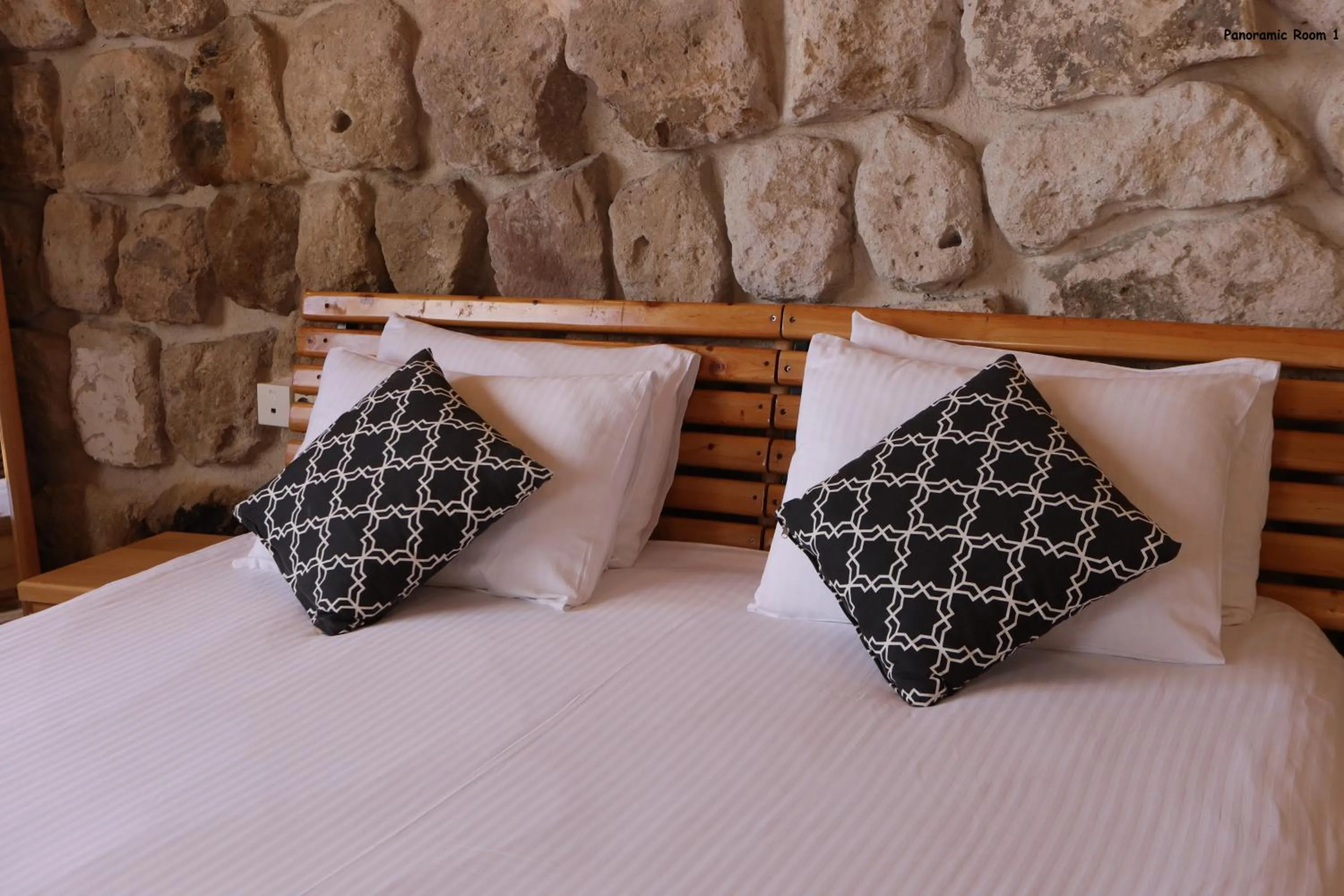 Bed in Pinhan Cave Suites