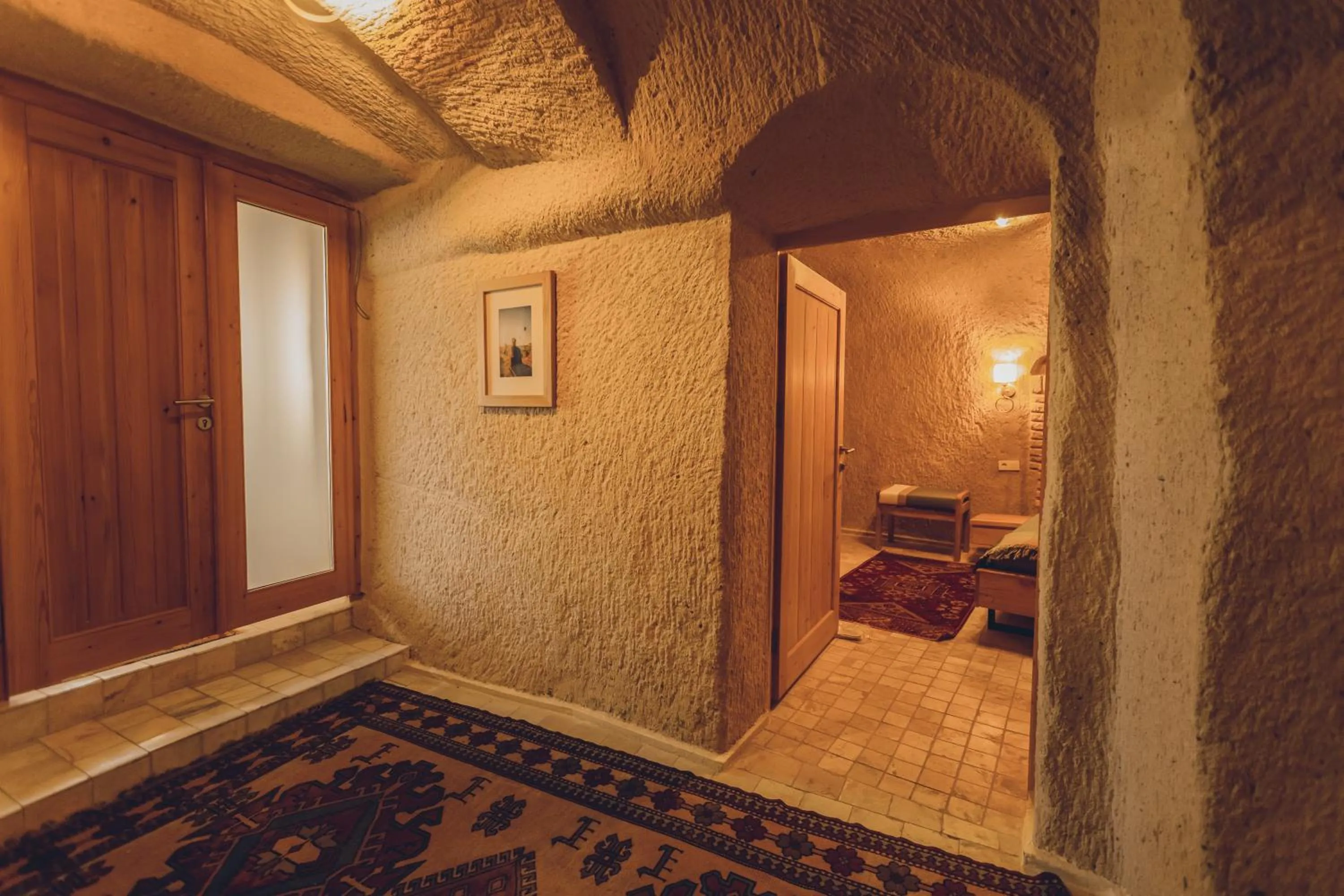 Bed in Pinhan Cave Suites