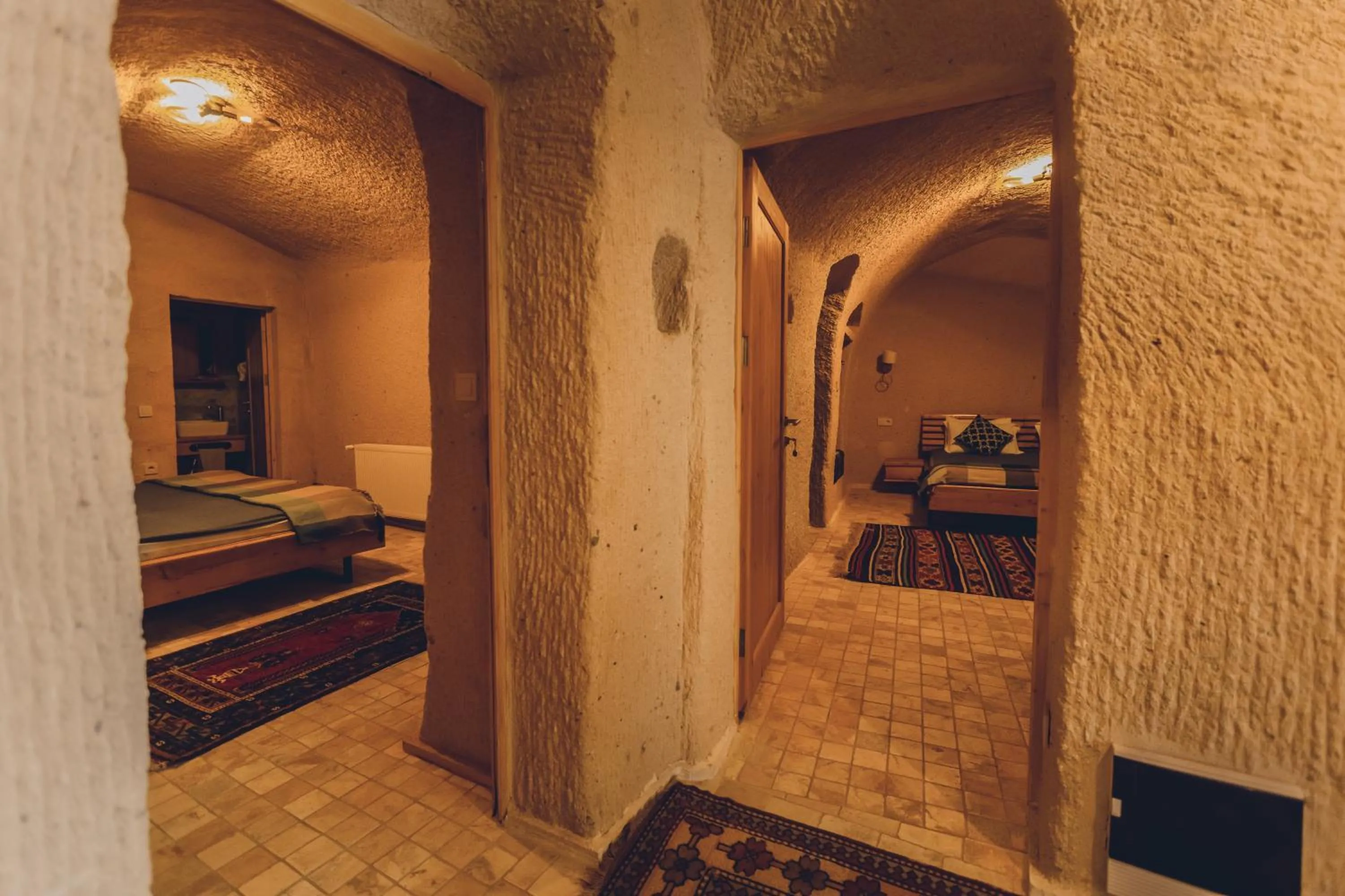 Bed in Pinhan Cave Suites