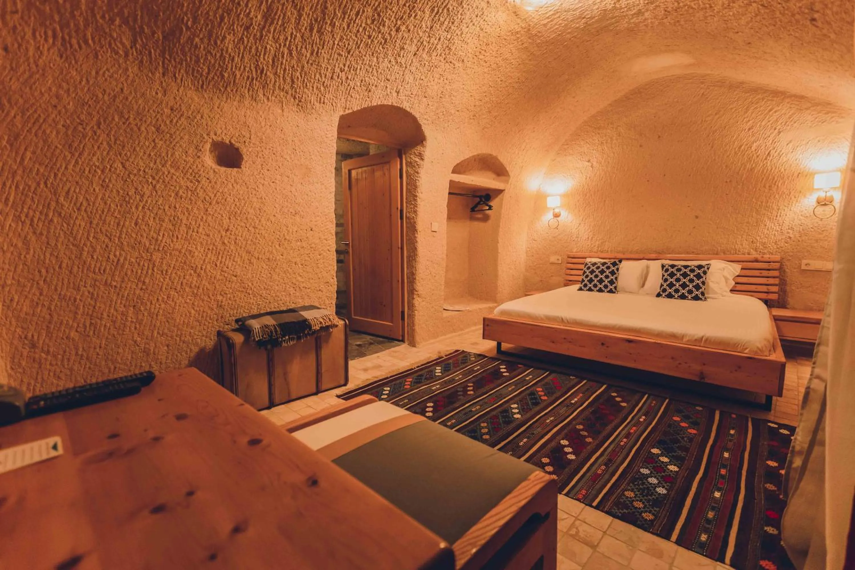 Bed in Pinhan Cave Suites