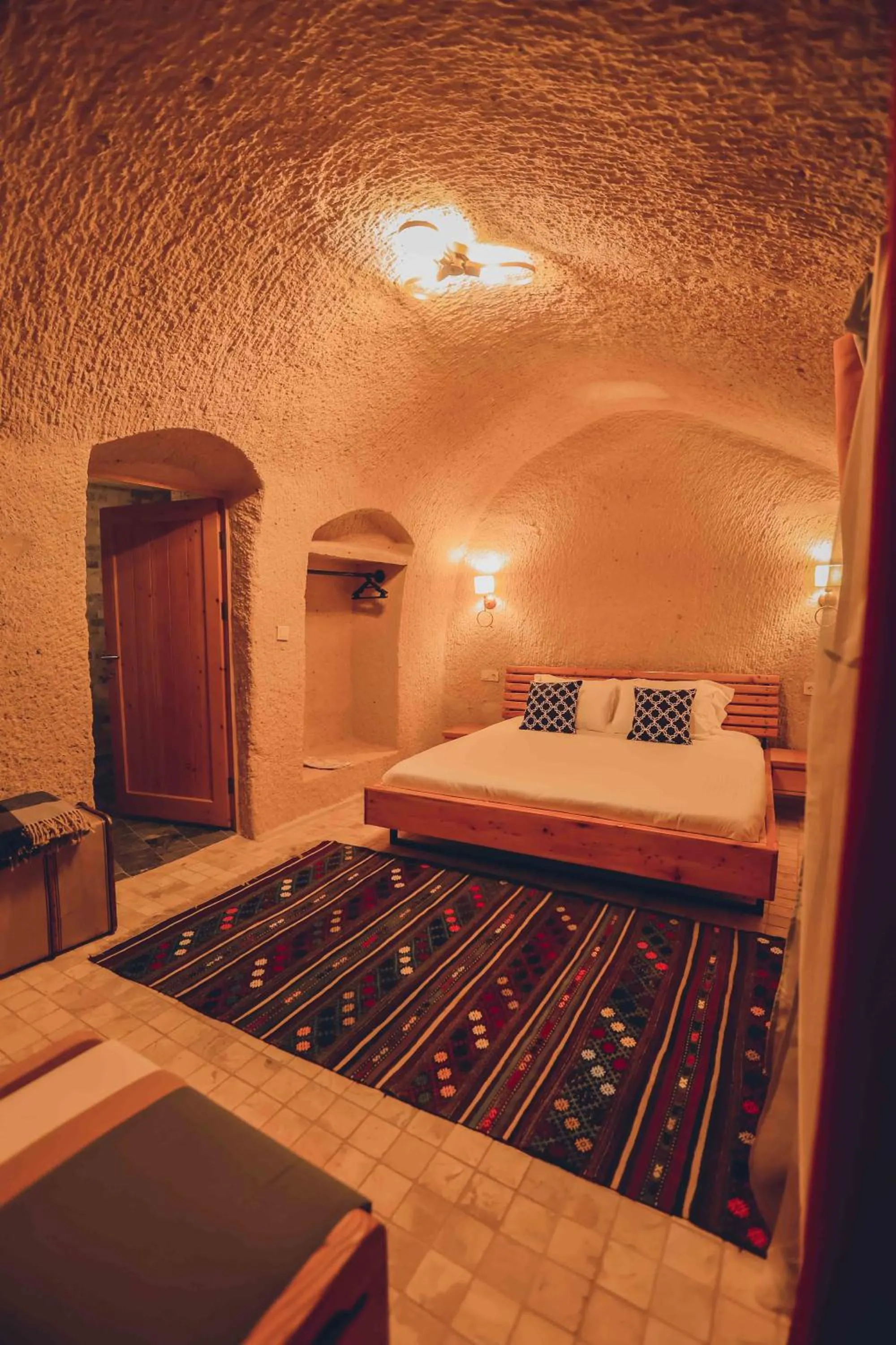 Bed in Pinhan Cave Suites