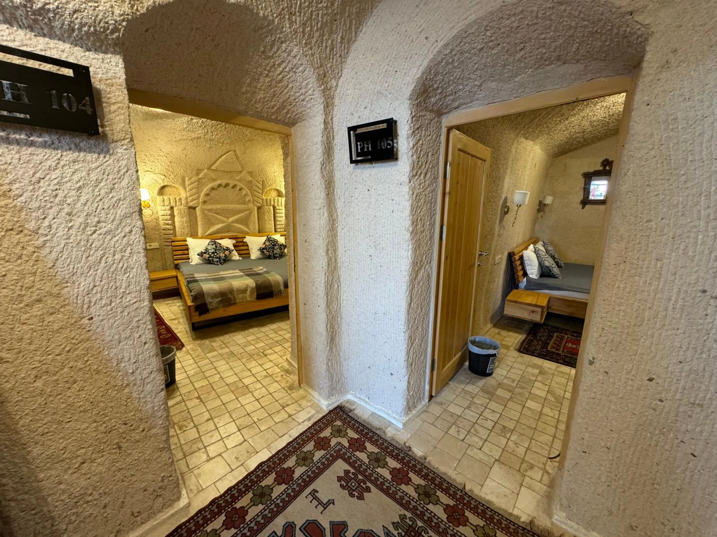 Bed in Pinhan Cave Suites