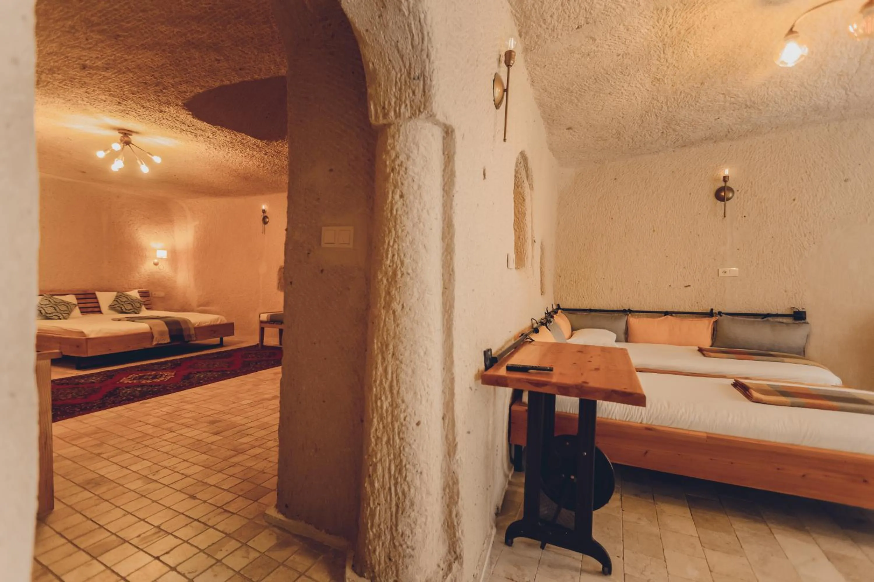 Bed in Pinhan Cave Suites