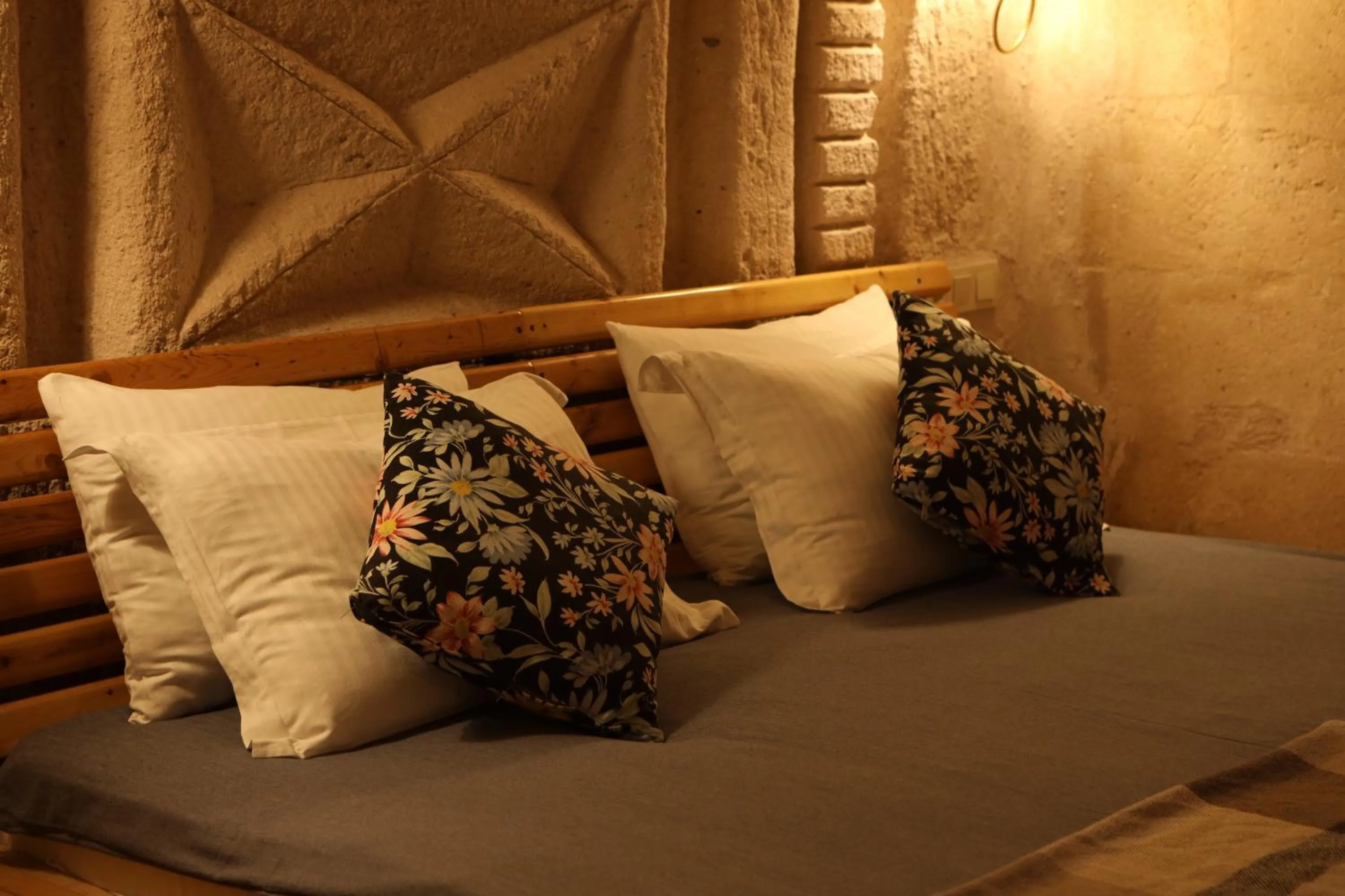 Bed in Pinhan Cave Suites