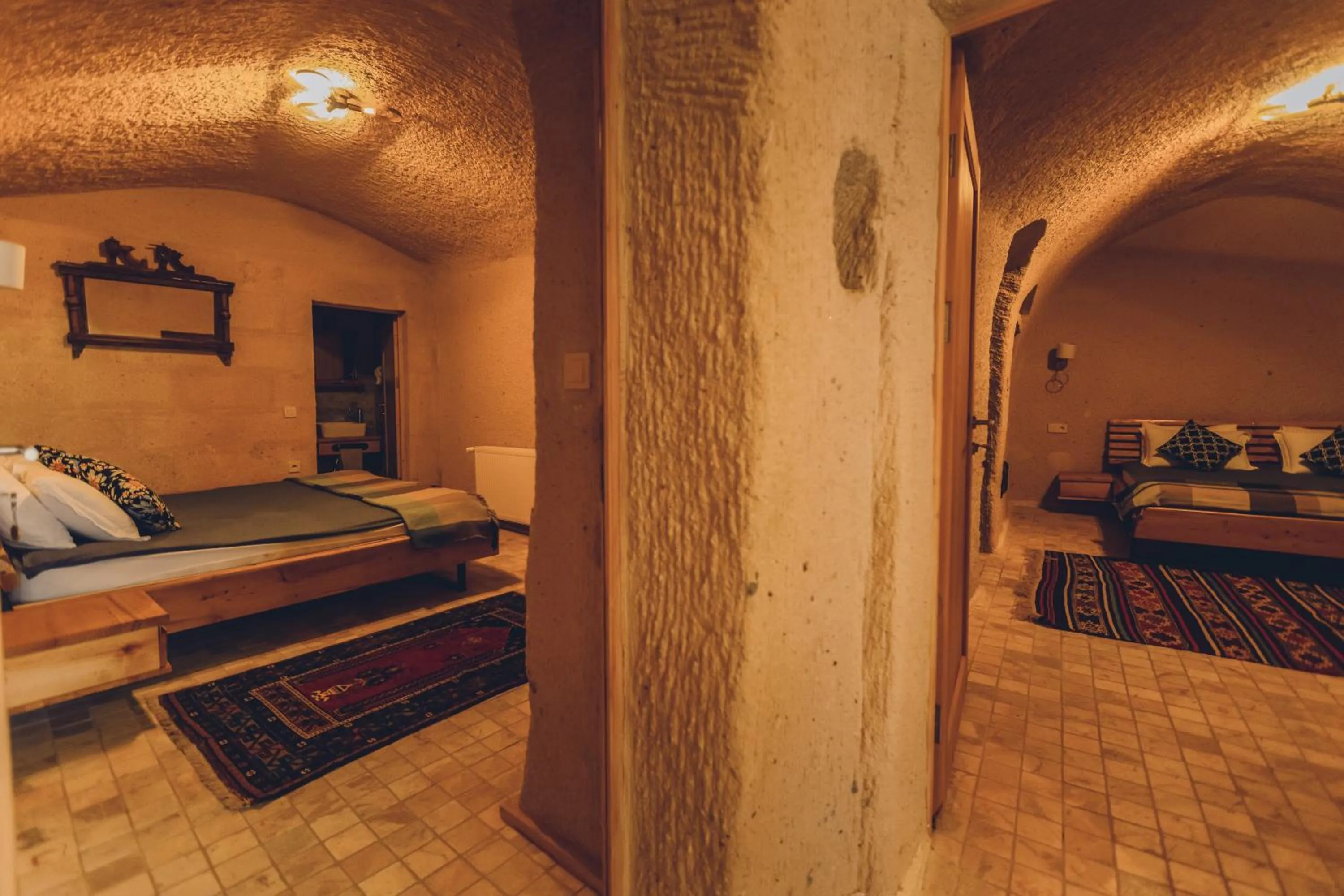 Bed in Pinhan Cave Suites