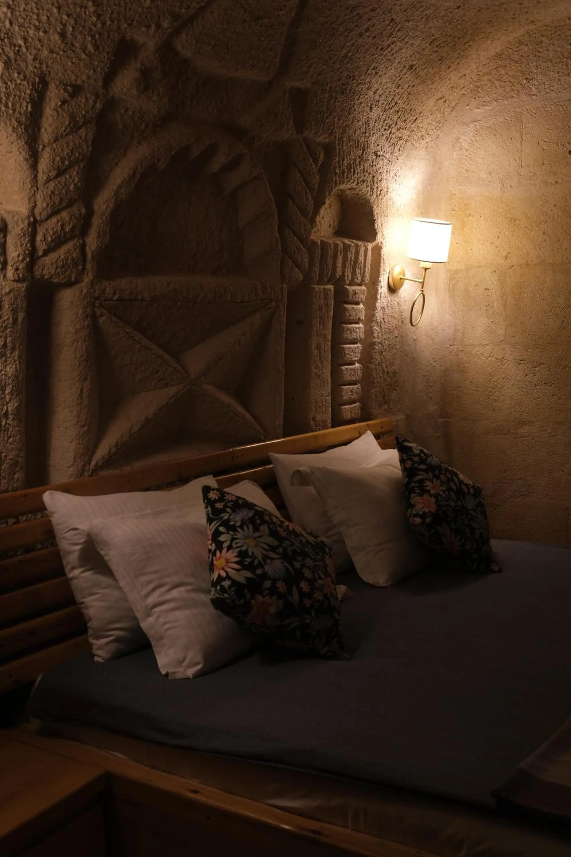 Bed in Pinhan Cave Suites