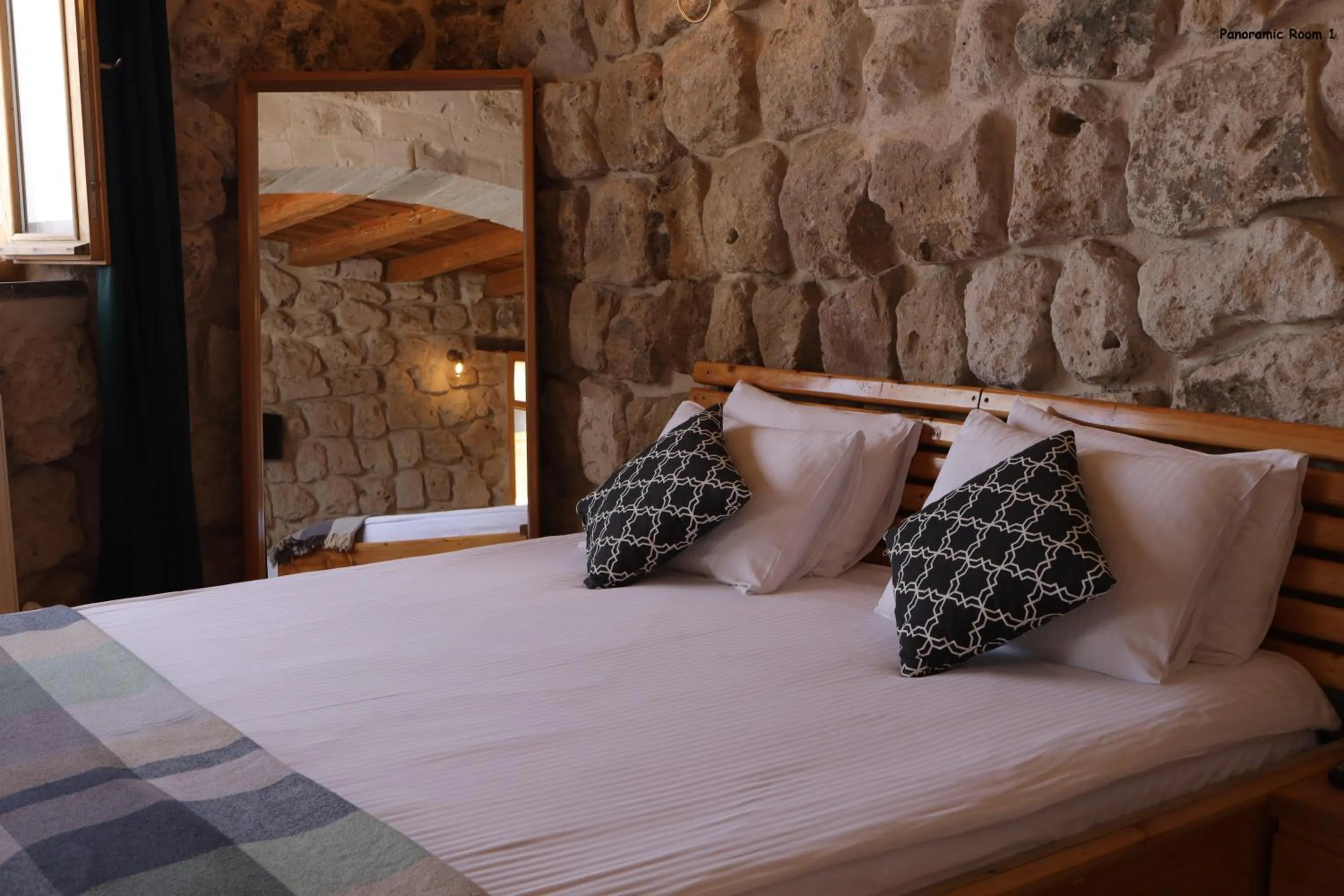 Bed in Pinhan Cave Suites