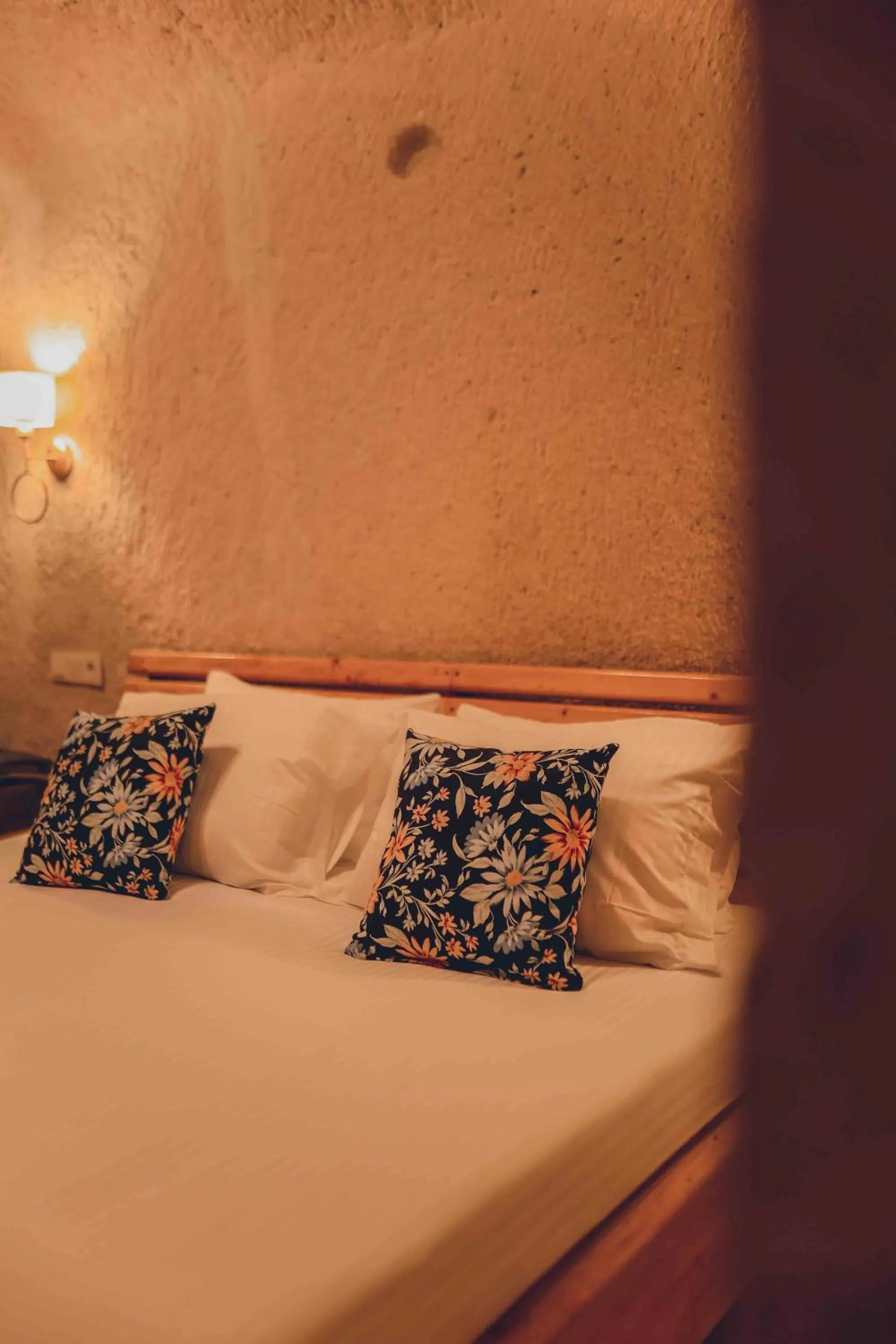 Bed in Pinhan Cave Suites