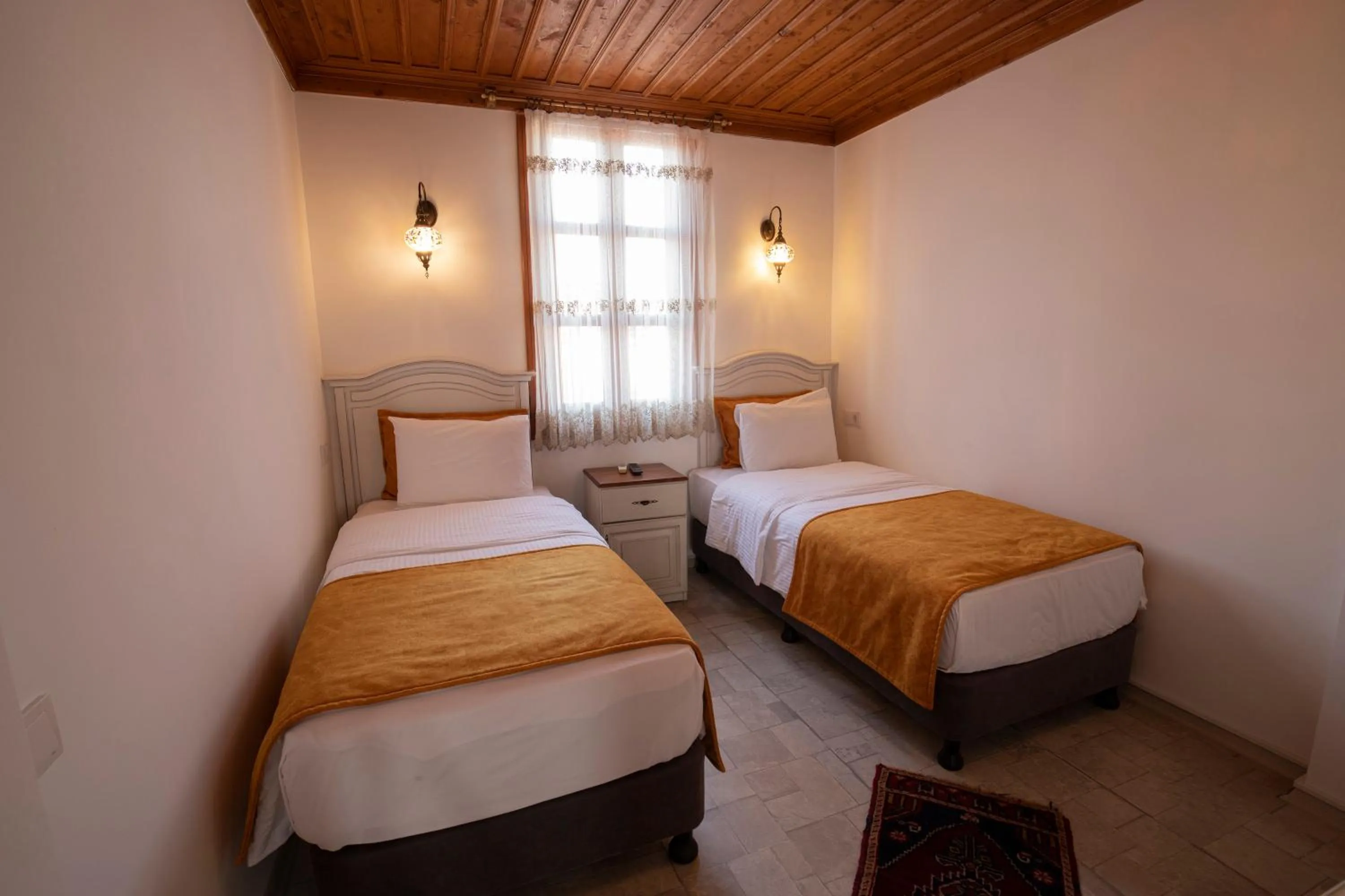 Bed in White Garden Hotel-Adult Only