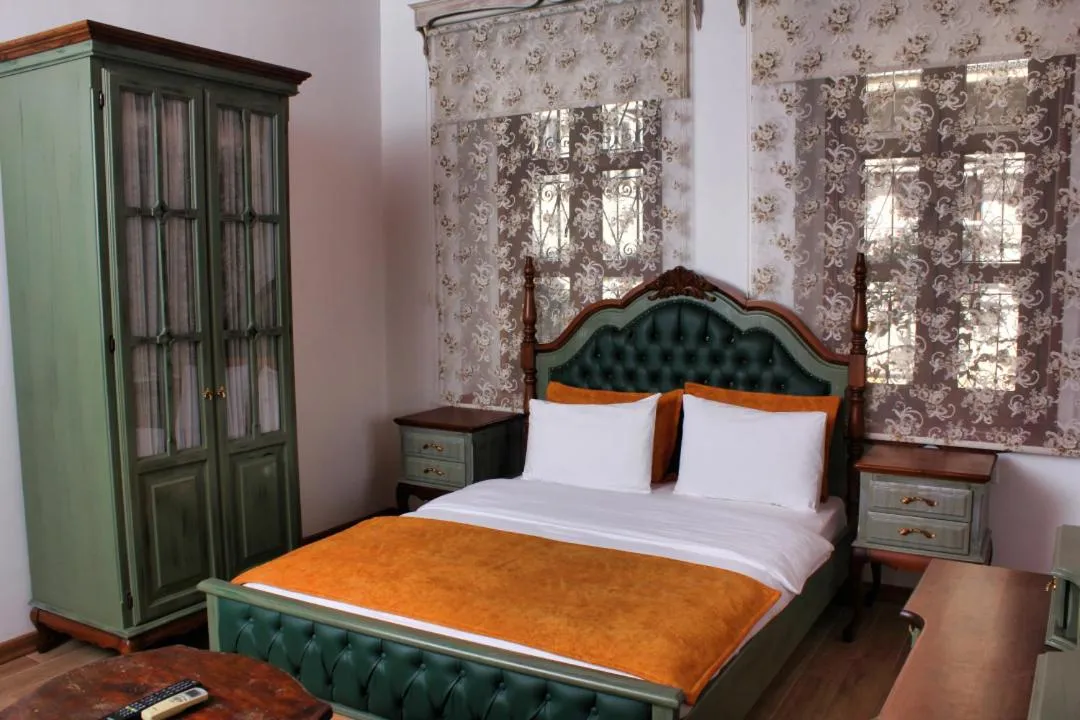 Bed in White Garden Hotel-Adult Only