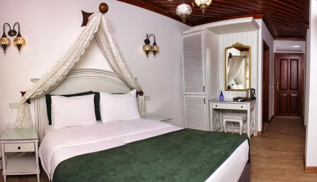 Bed in White Garden Hotel-Adult Only