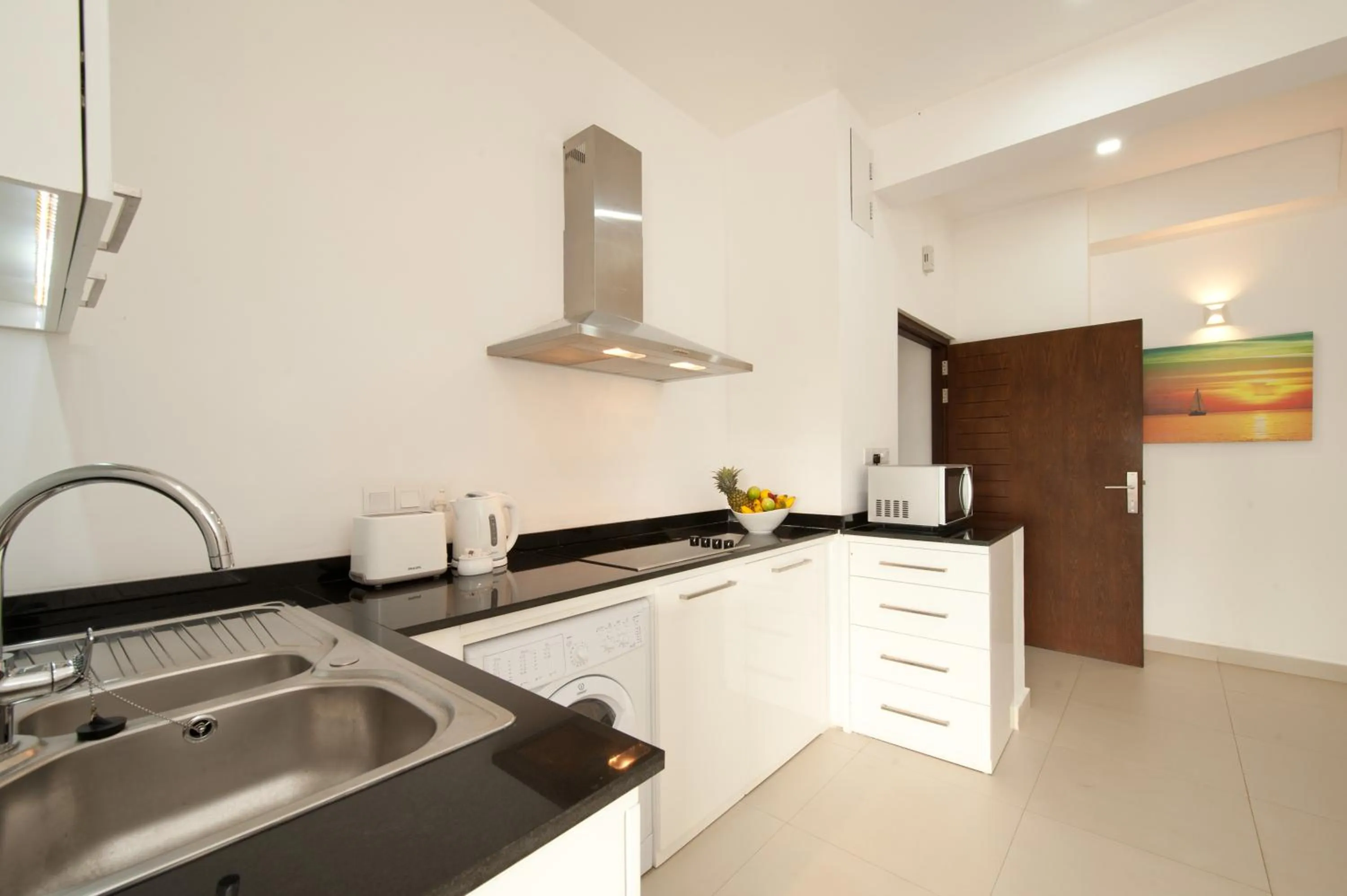 Kitchen or kitchenette in The Beach Apartments