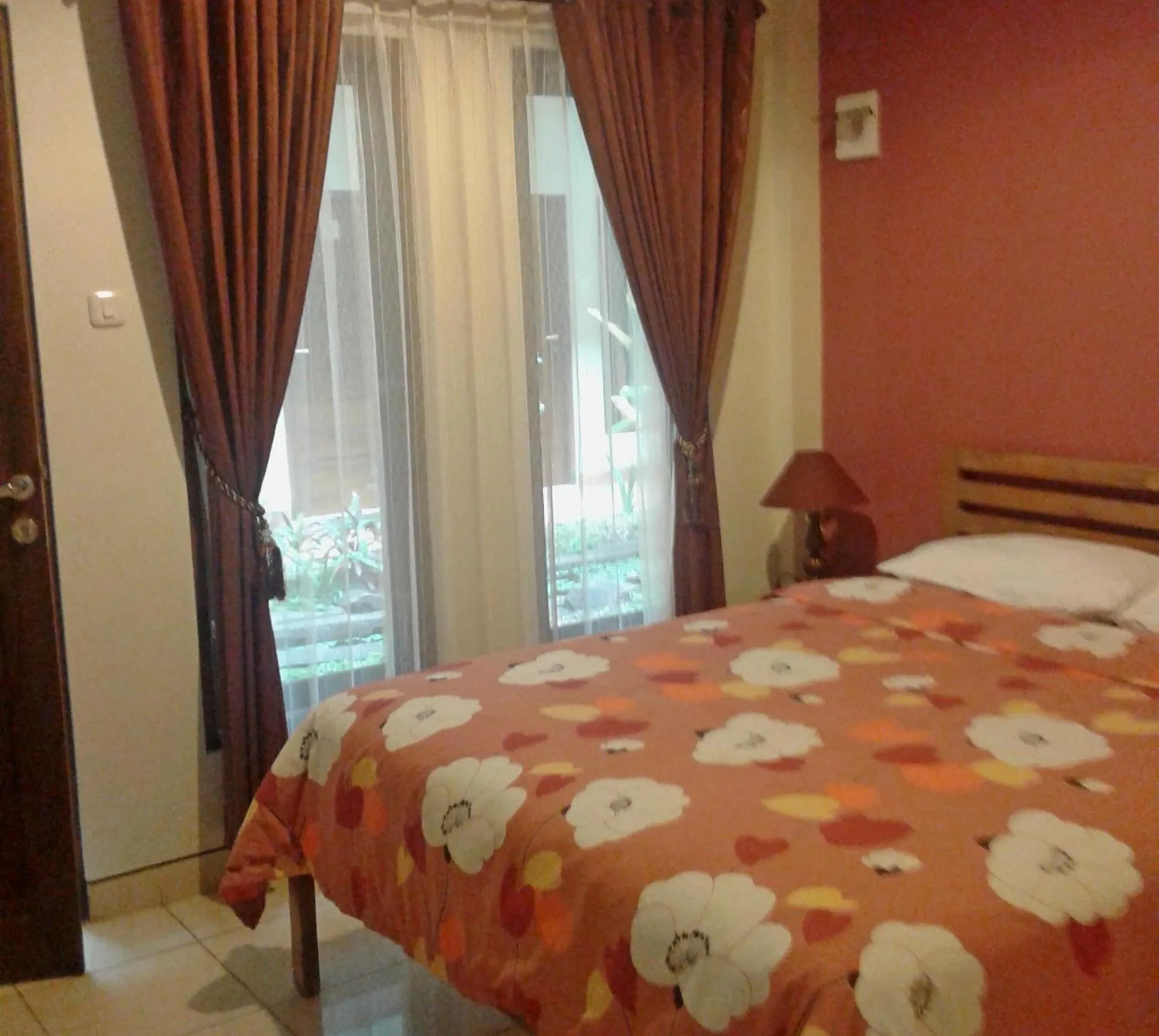 Bed in Aloha Hotel Yogyakarta