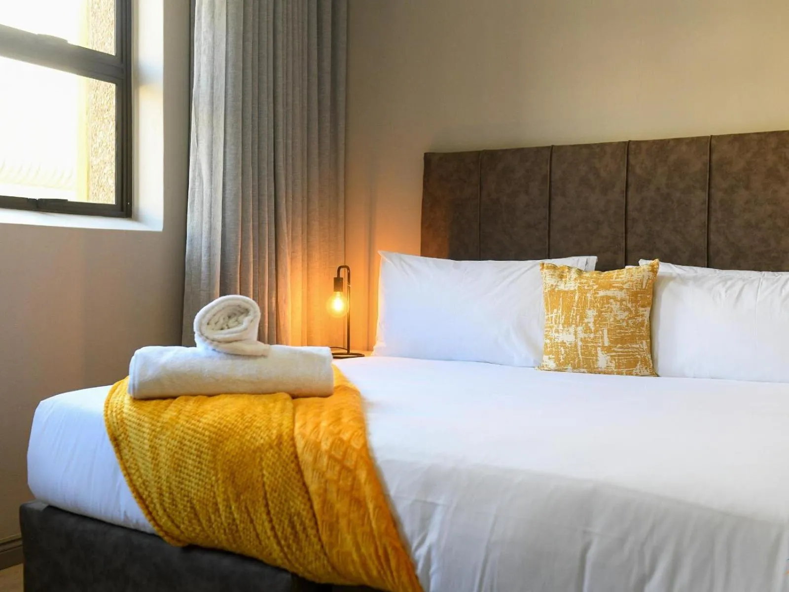 Bed in Next To Apartment Hotel