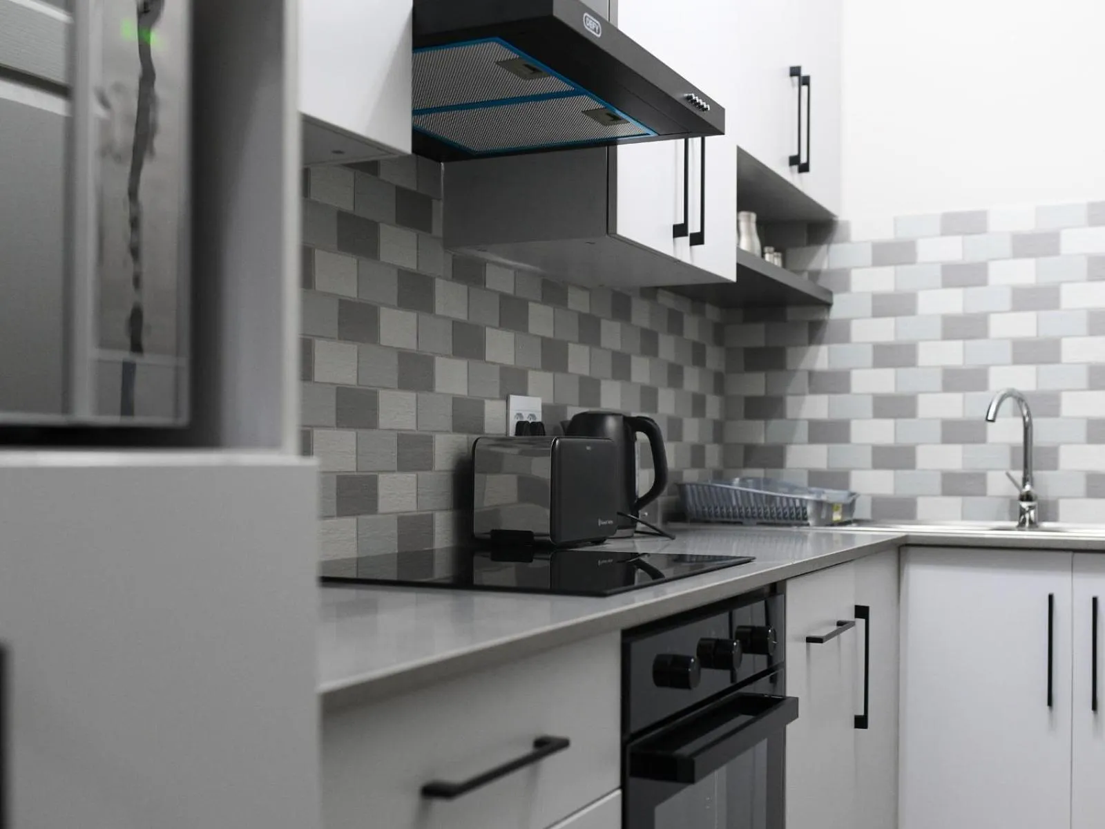 Kitchen or kitchenette in Next To Apartment Hotel