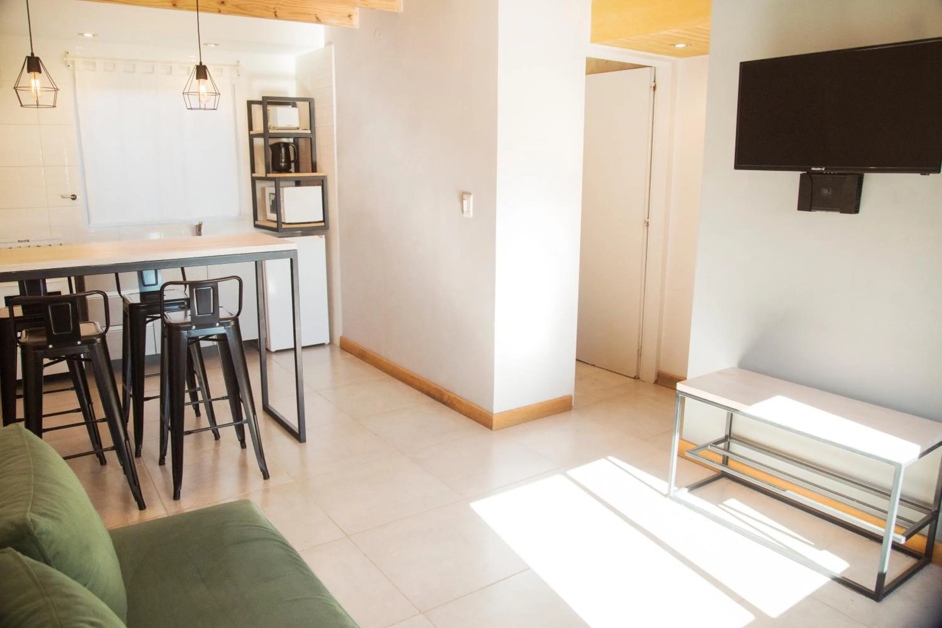 Kitchen or kitchenette in Apart Hotel Jardín