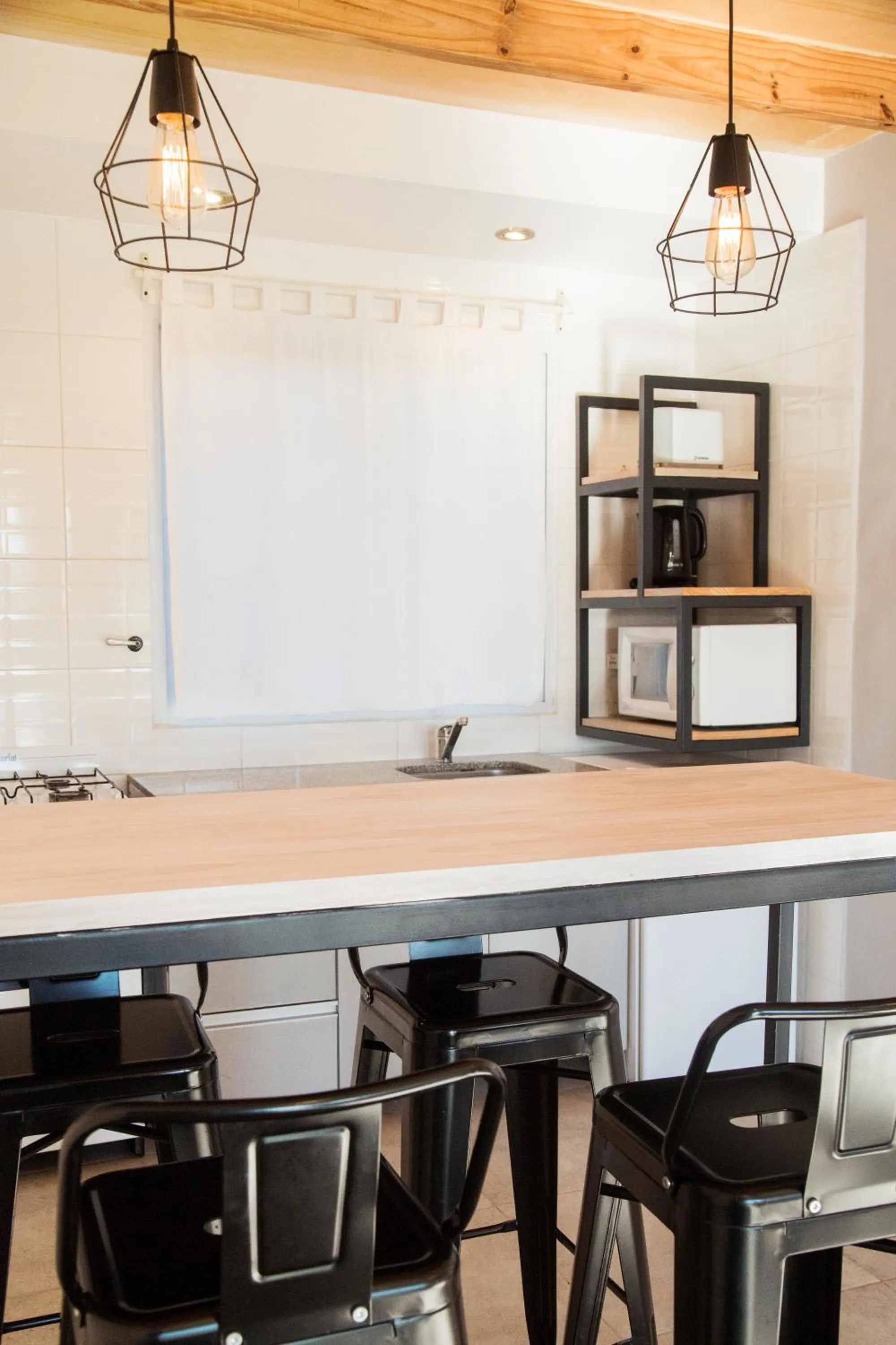 Kitchen or kitchenette in Apart Hotel Jardín