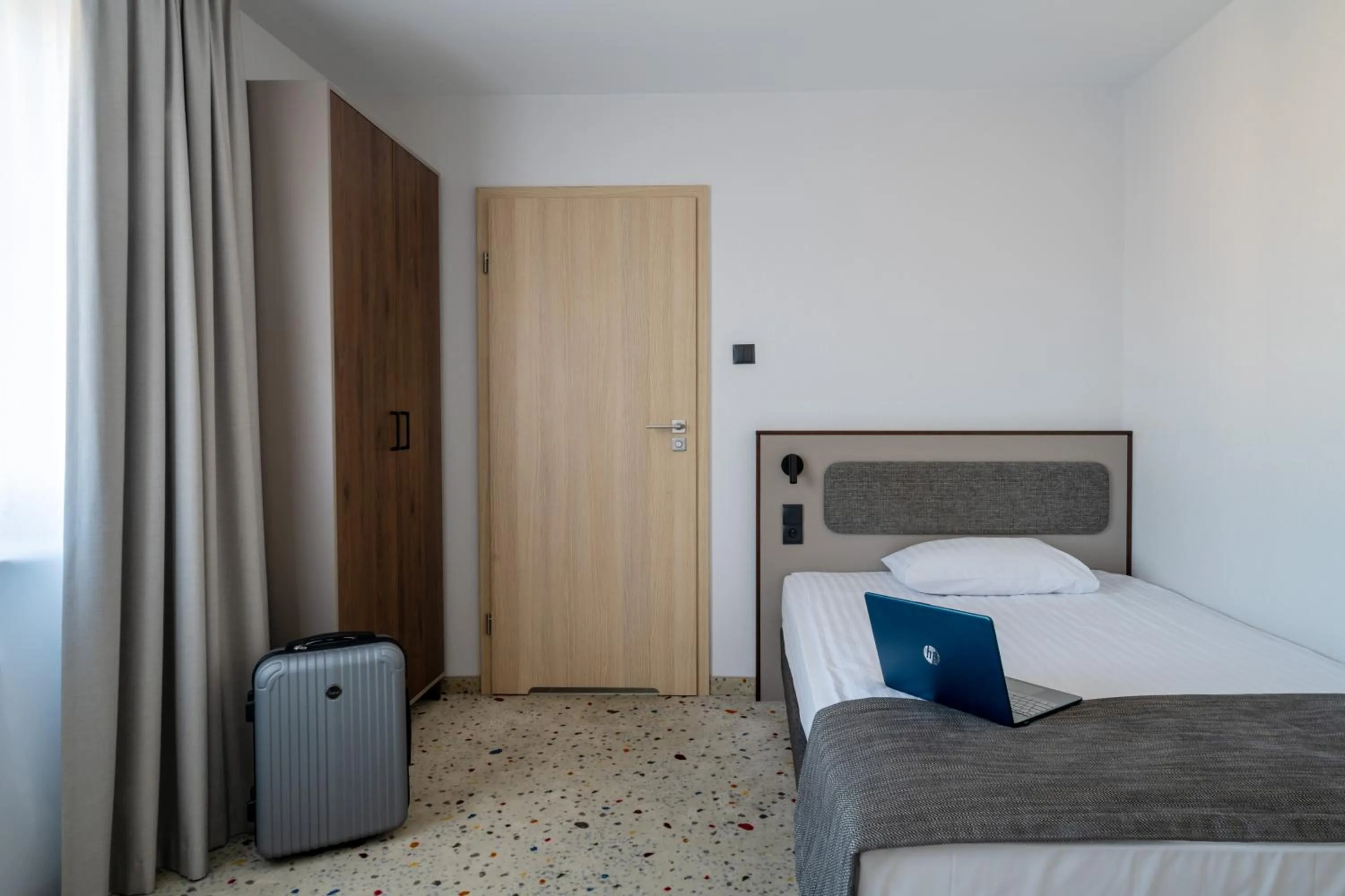 Bed in Antares Hotel