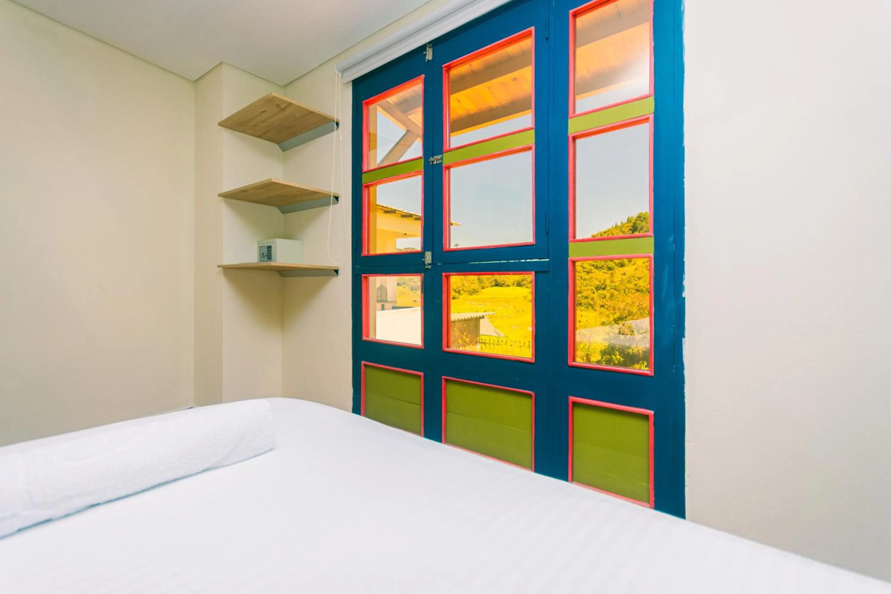 Bed in Hotel Bambu Guatape