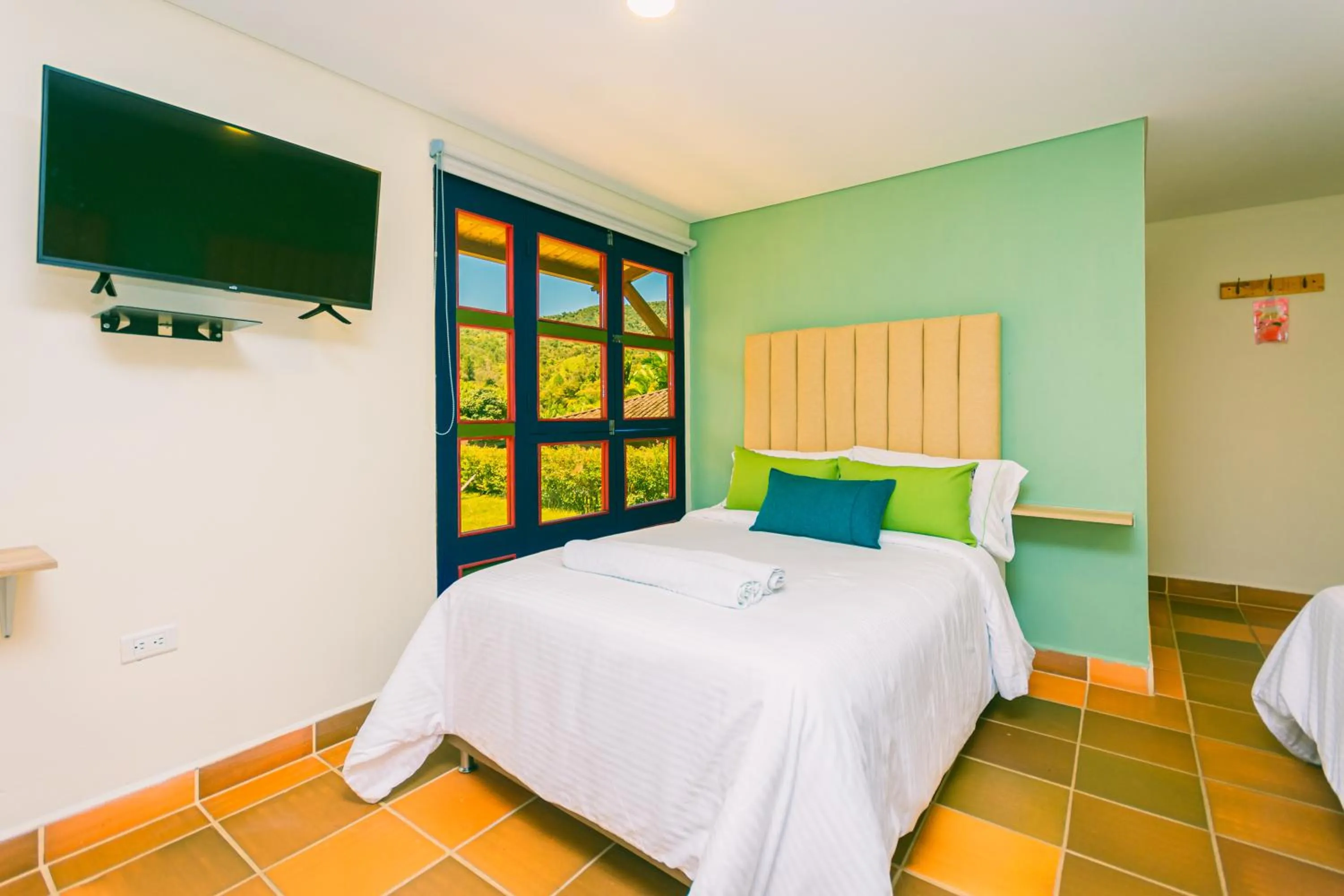 Bed in Hotel Bambu Guatape
