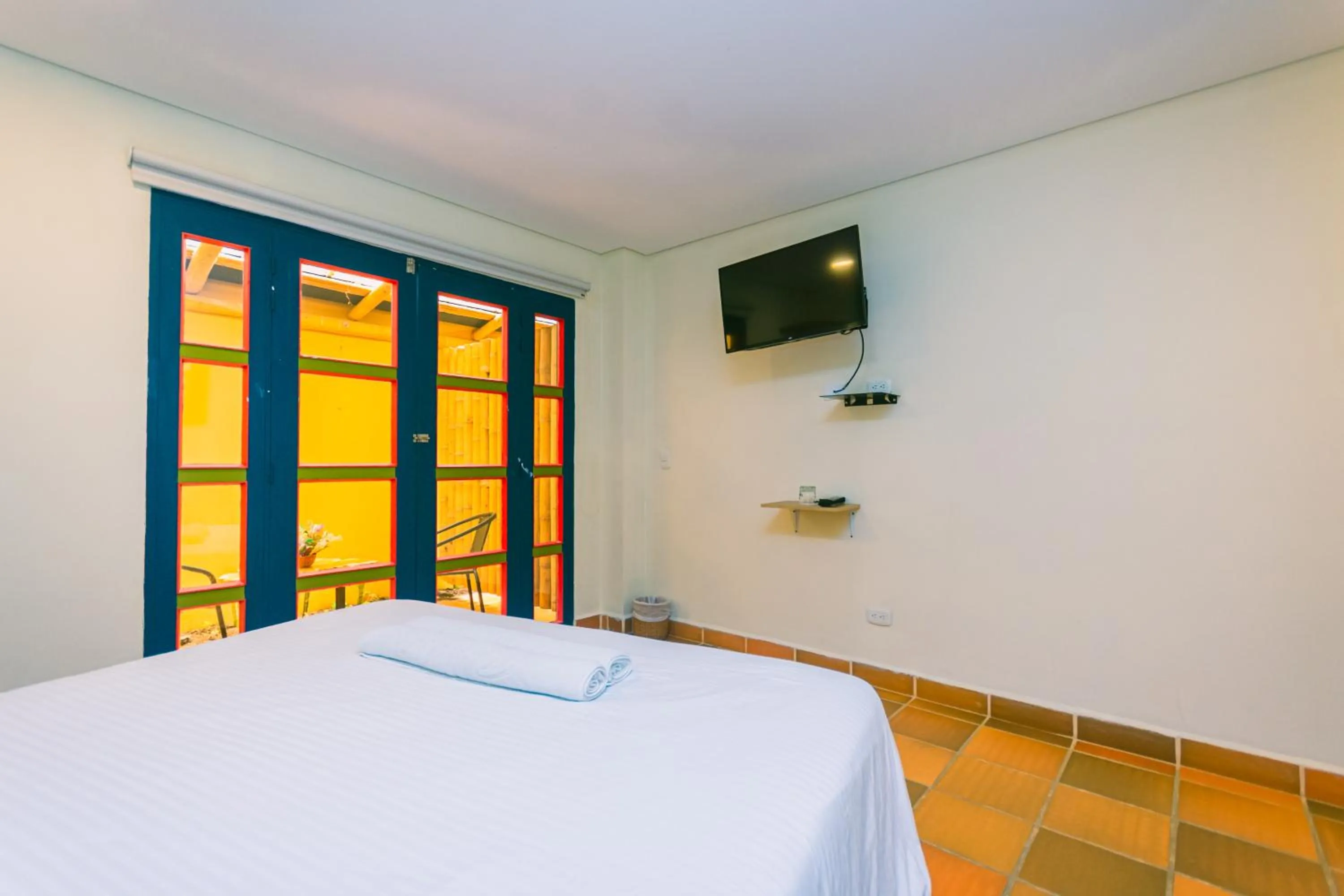 Bed in Hotel Bambu Guatape