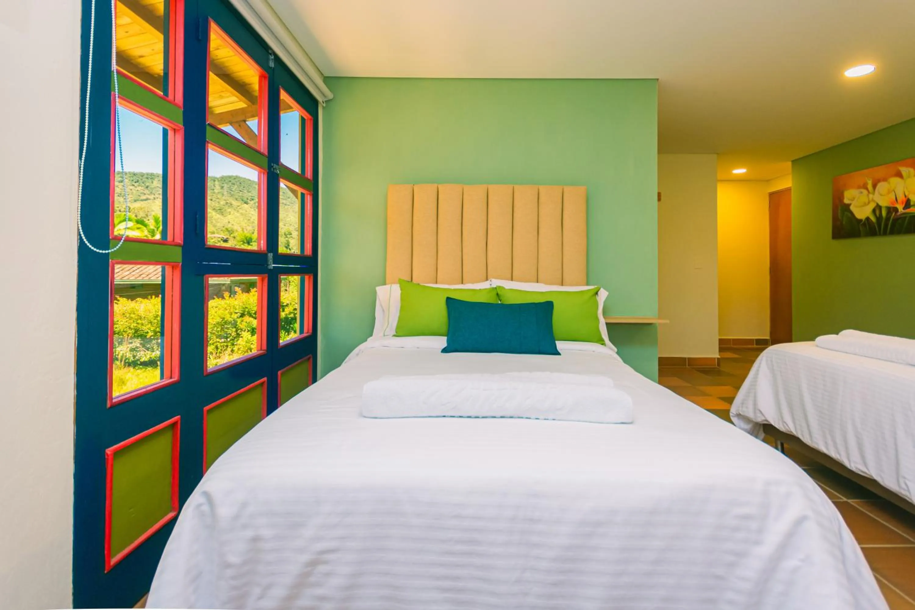 Bed in Hotel Bambu Guatape