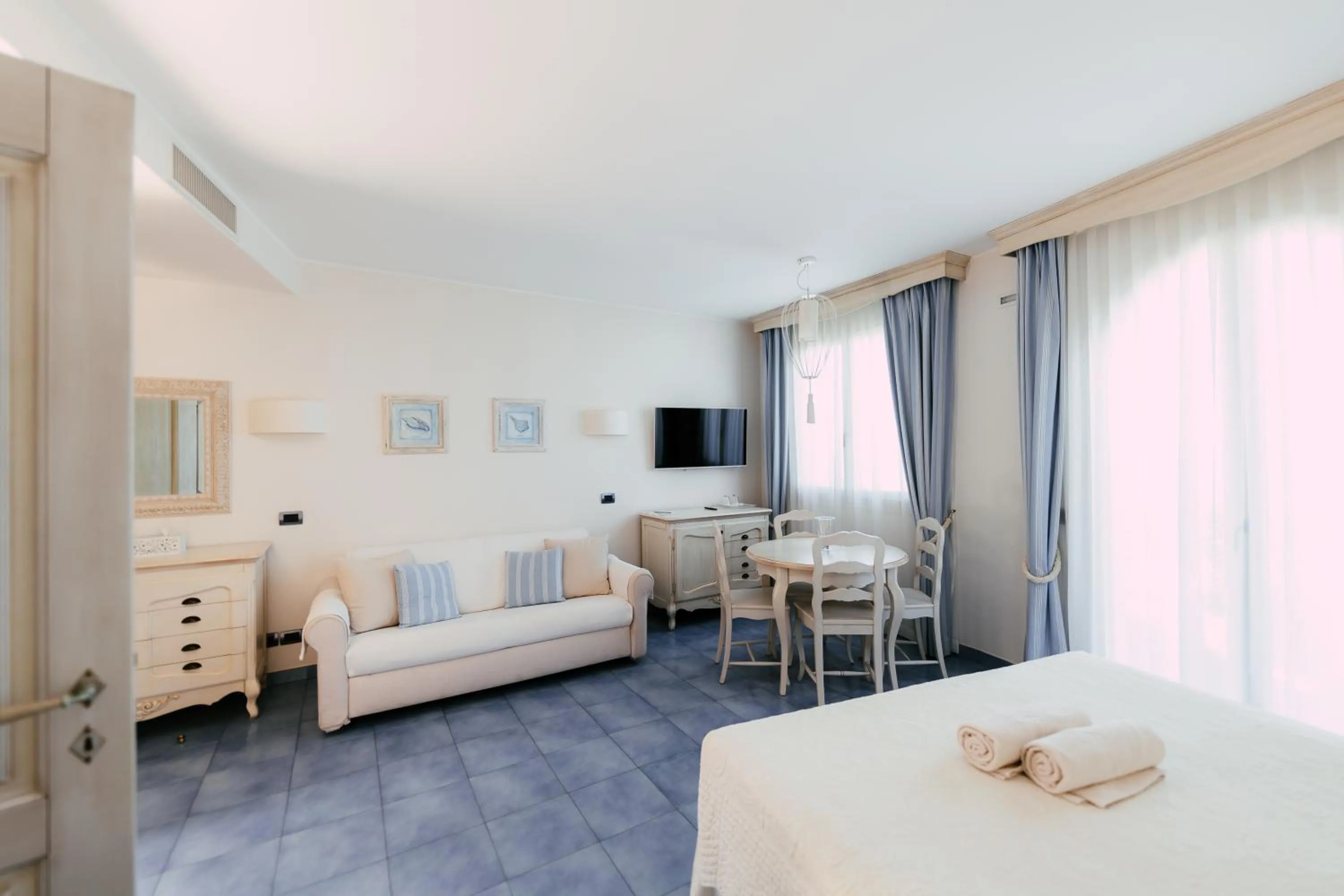 Bed in Baia Delphis Resort