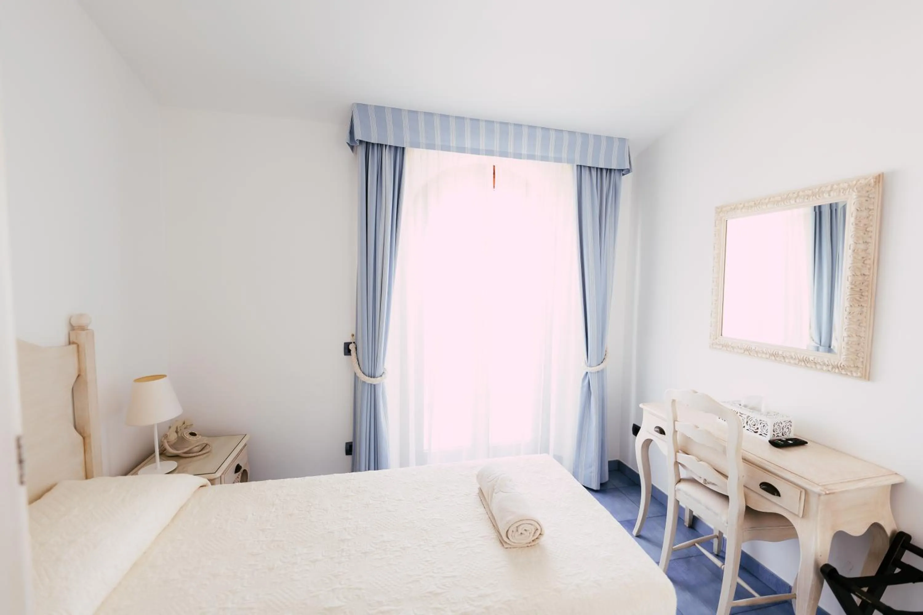 Bed in Baia Delphis Resort