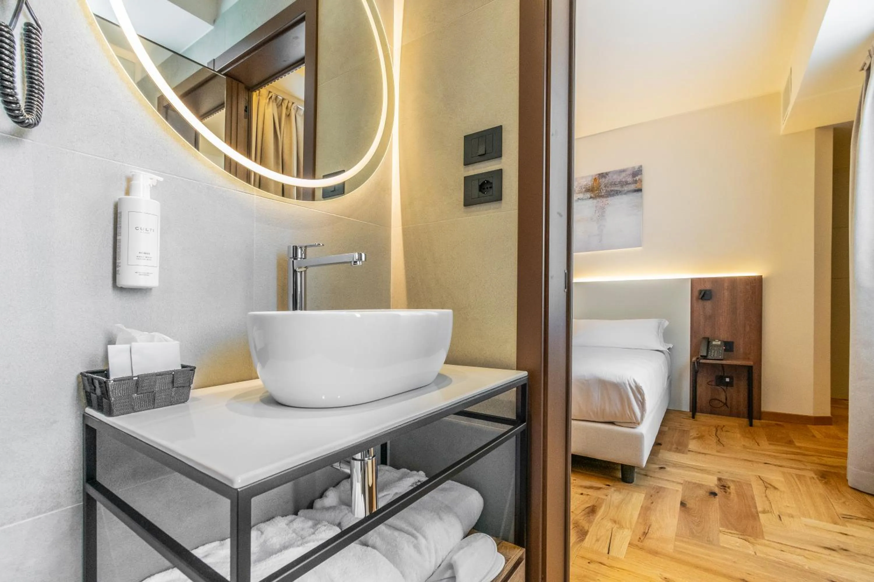 Bathroom, Bed in Madi city Hotel