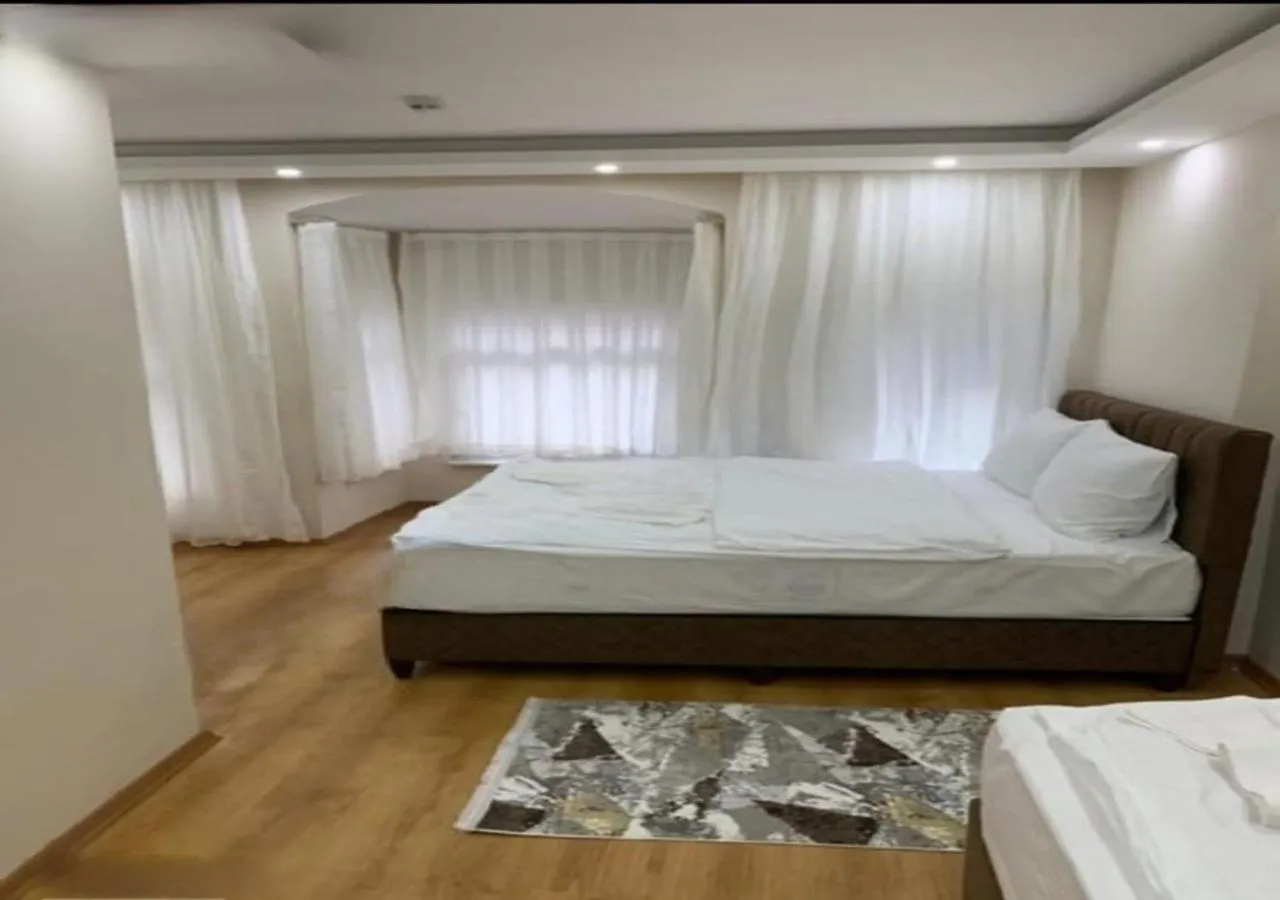 Bed in BLUE ROYAL HOTEL