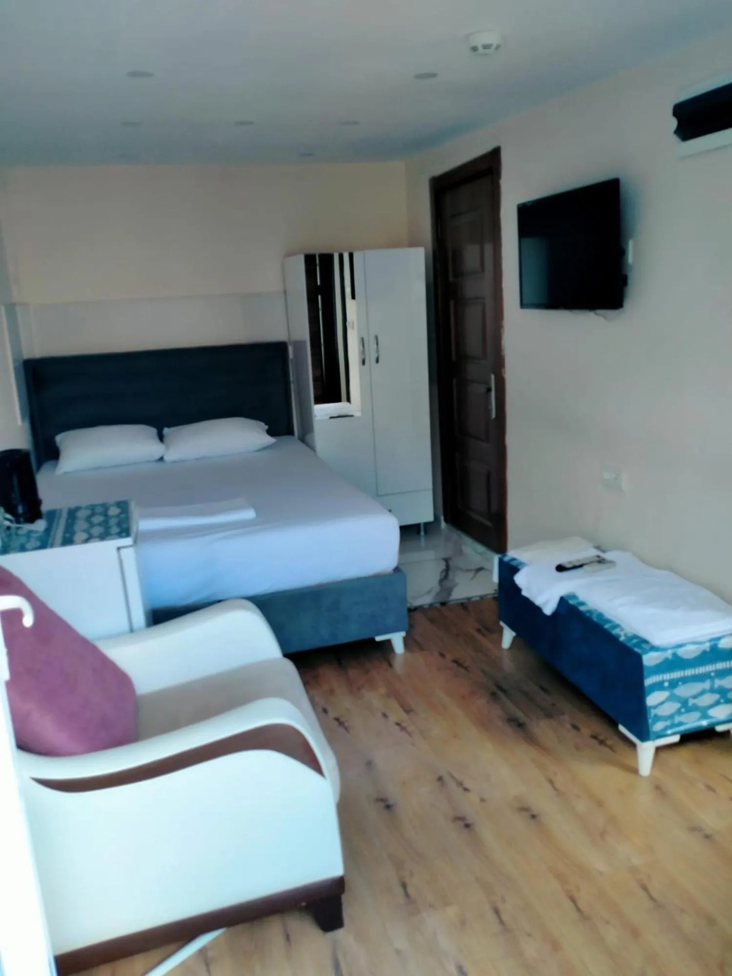 Photo of the whole room, Bed in BLUE ROYAL HOTEL