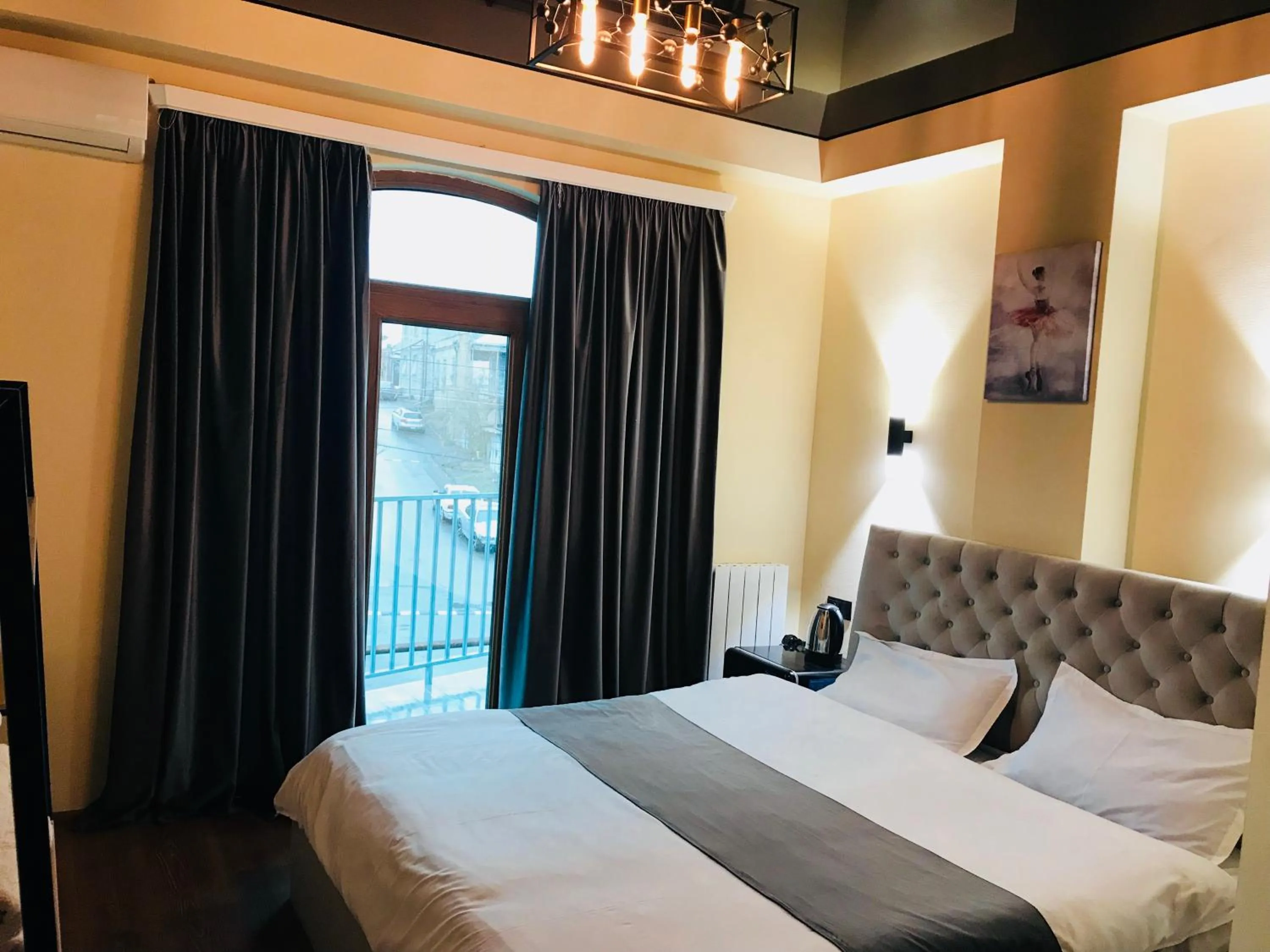 Bed in Natali Boutique Hotel