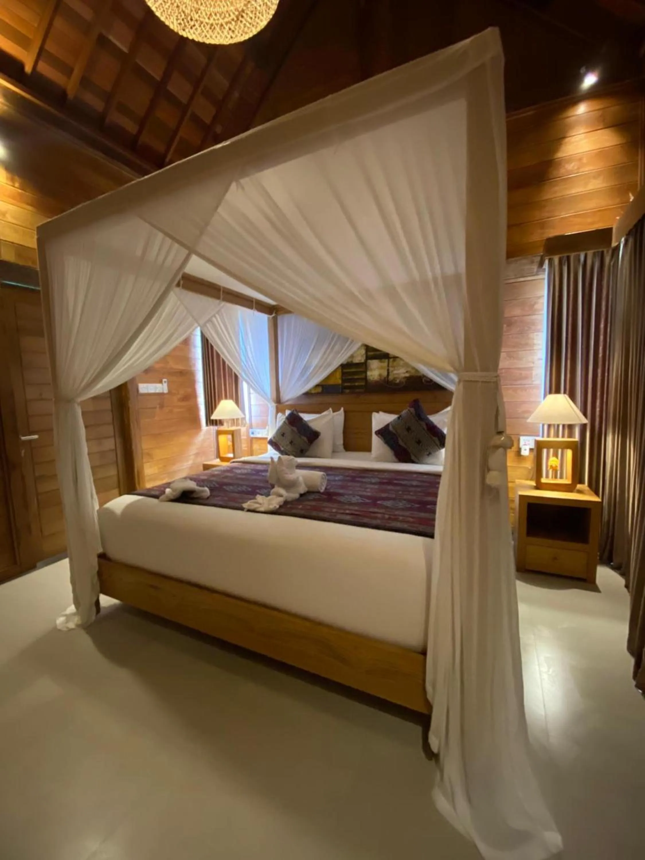 Bed in Kubu Sakian Villa and Restaurant Sidemen