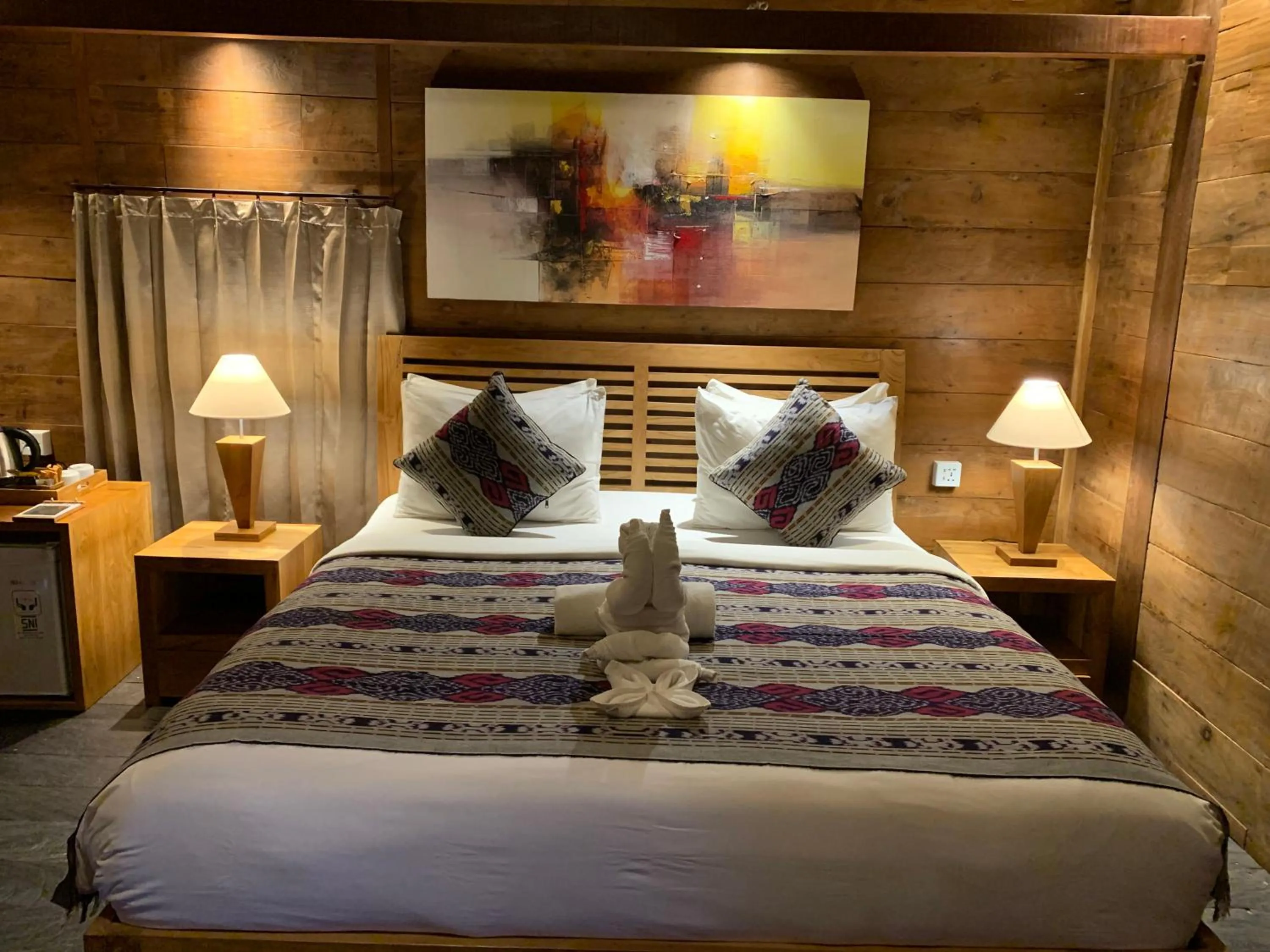 Bed in Kubu Sakian Villa and Restaurant Sidemen