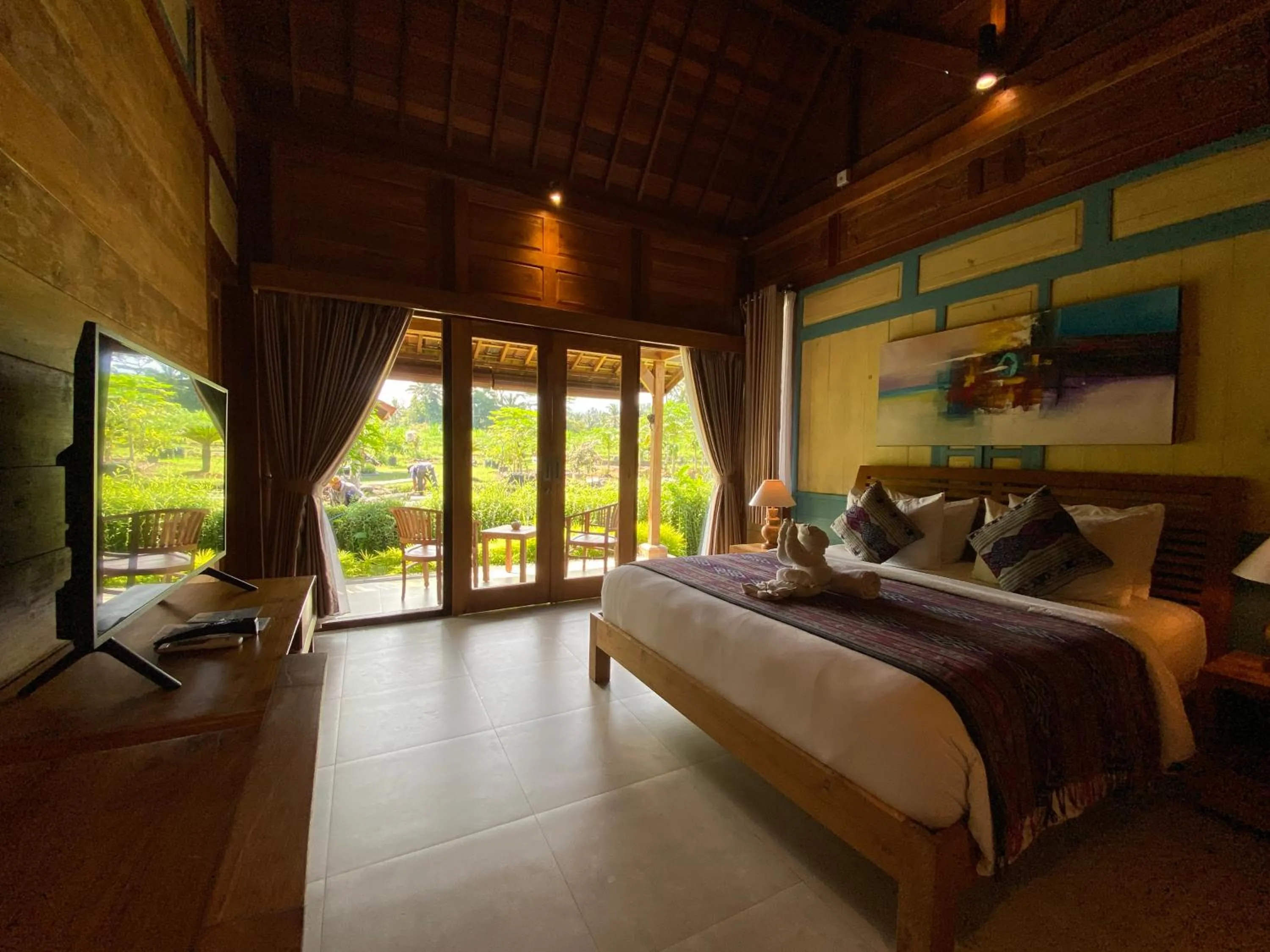 Bed in Kubu Sakian Villa and Restaurant Sidemen
