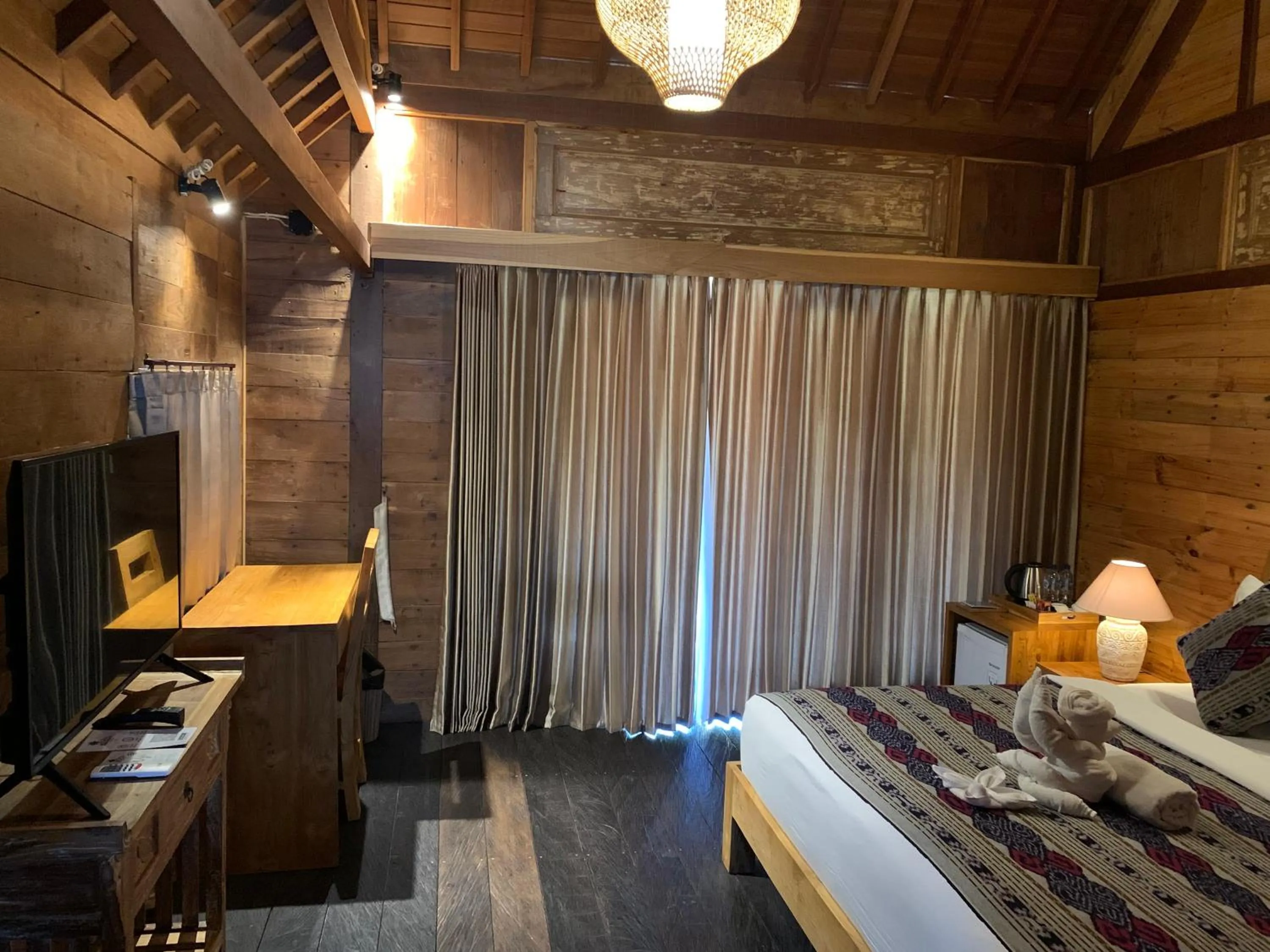 Bed in Kubu Sakian Villa and Restaurant Sidemen