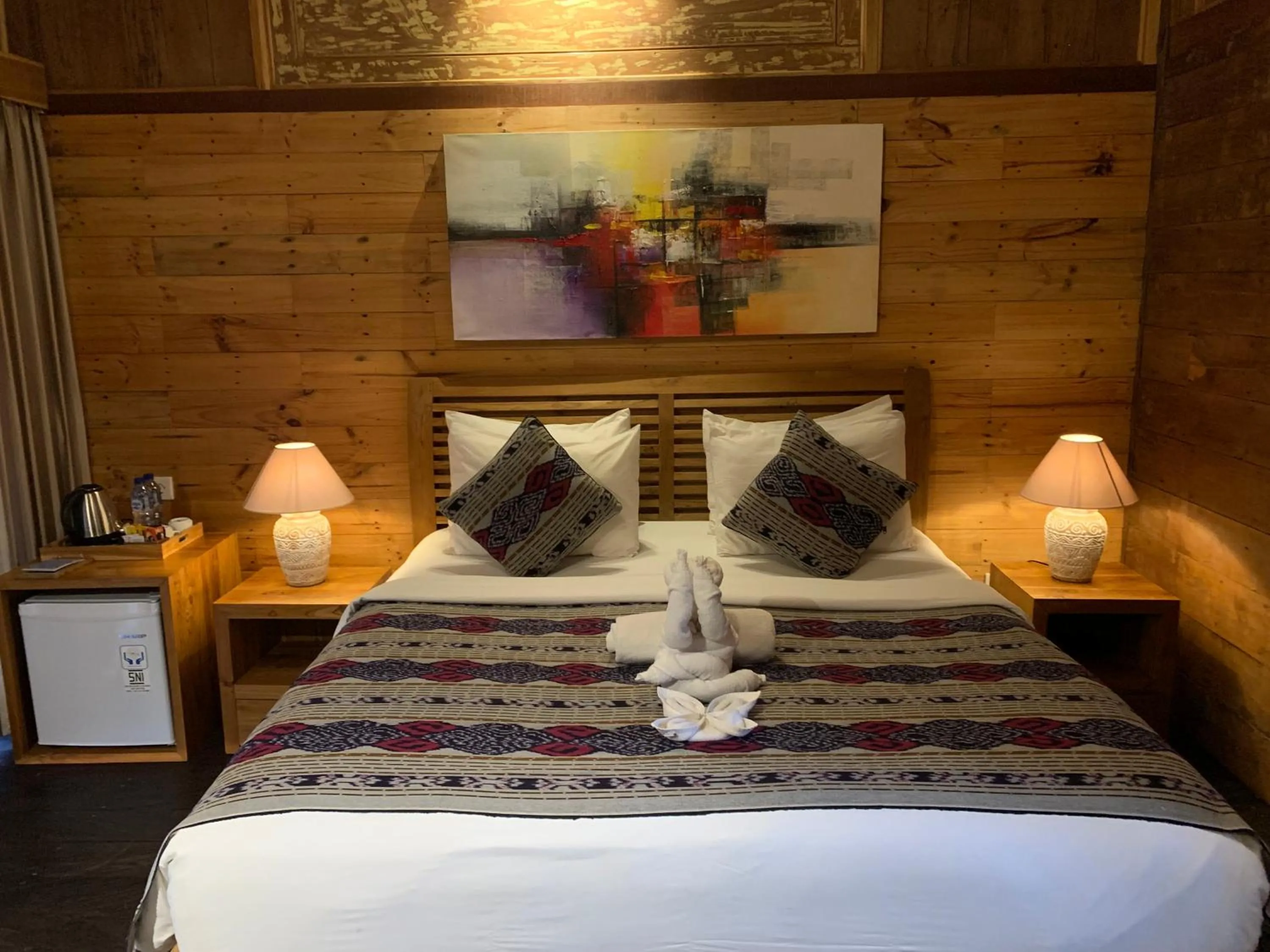 Bed in Kubu Sakian Villa and Restaurant Sidemen