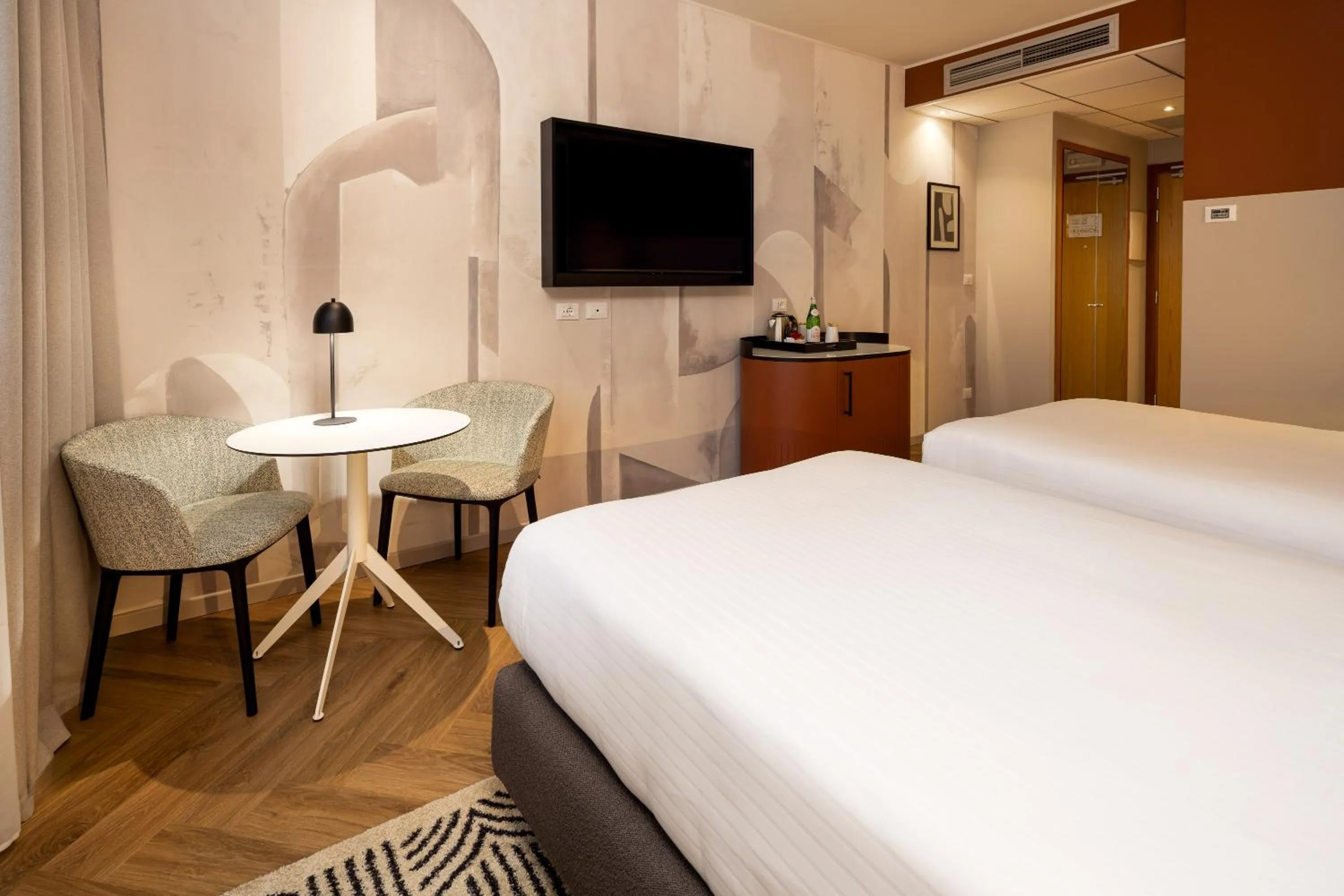 Bed in Crowne Plaza Padova by IHG