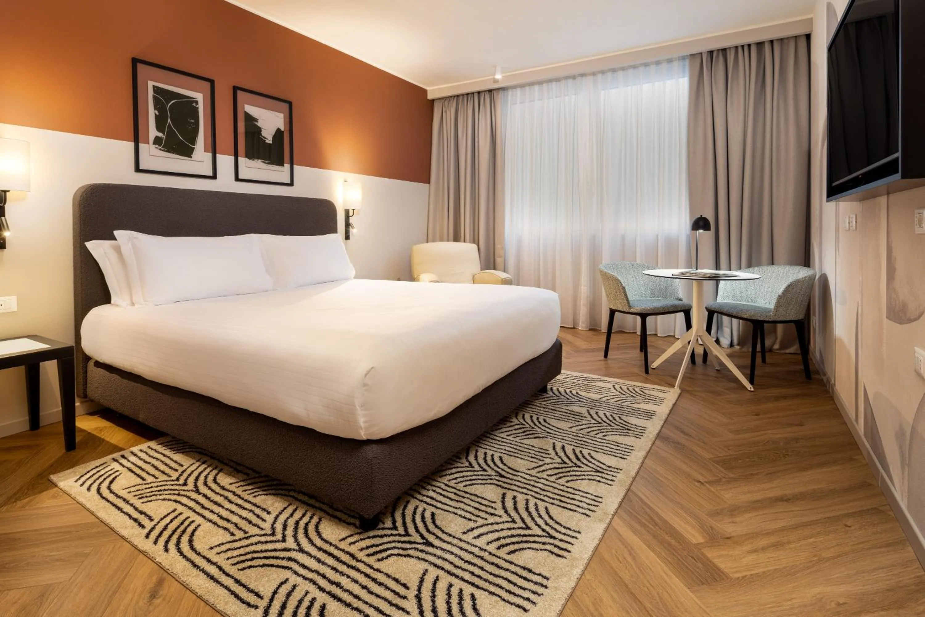 Bed in Crowne Plaza Padova by IHG