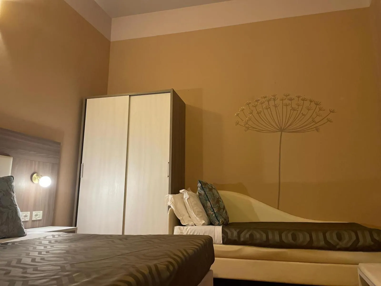 Bed in Hotel Maxim Axial