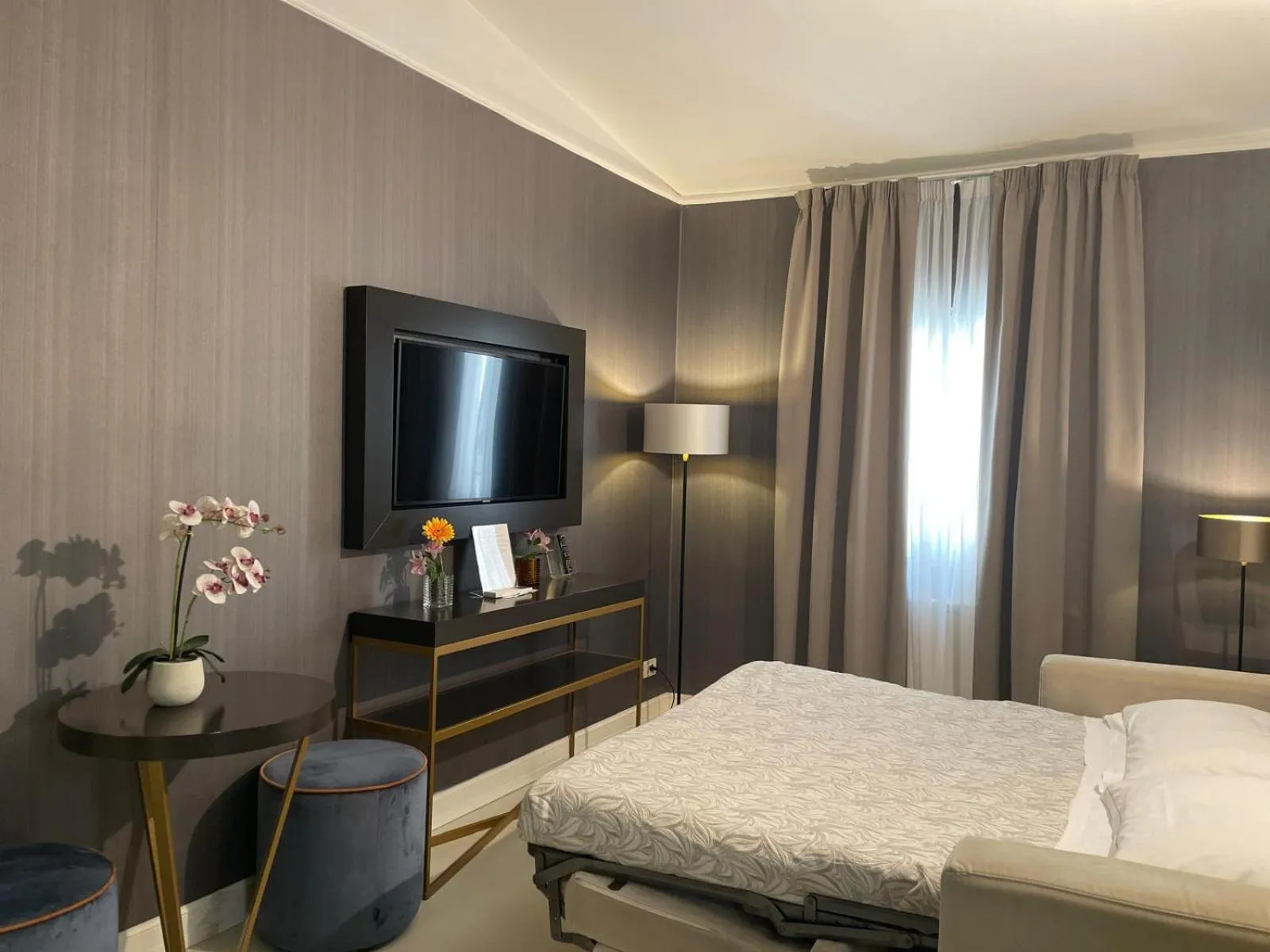 Bed in Hotel Maxim Axial