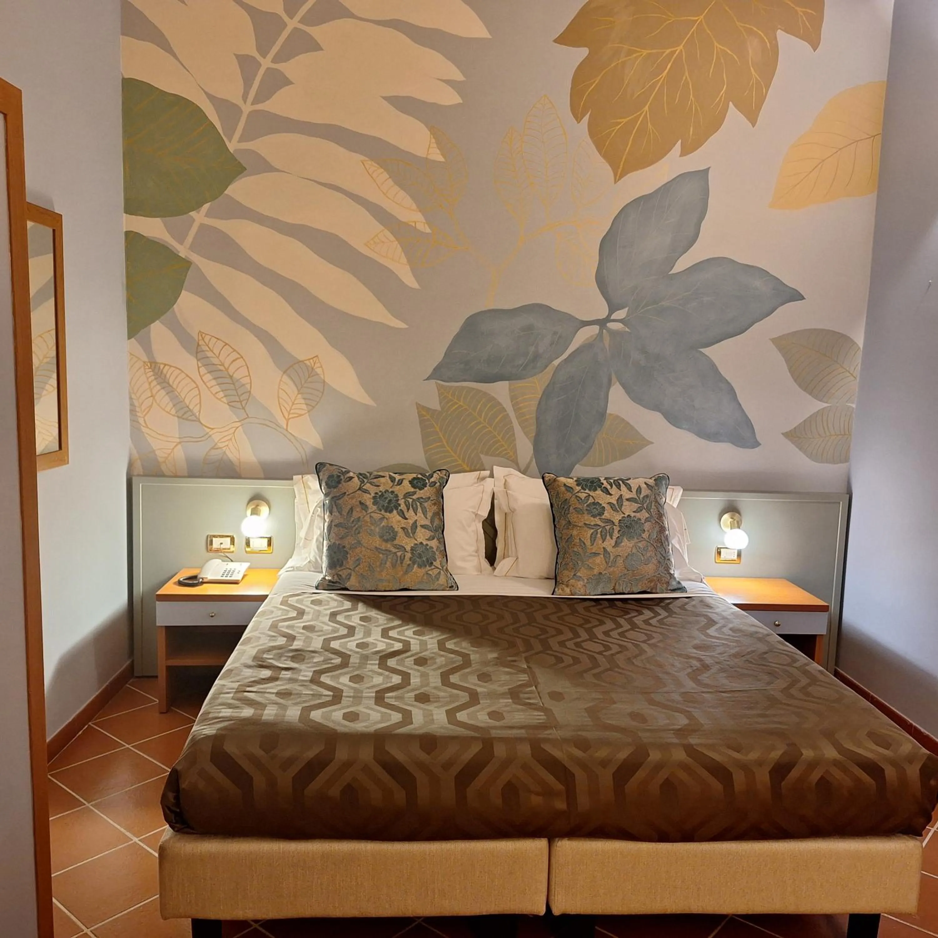 Bed in Hotel Maxim Axial