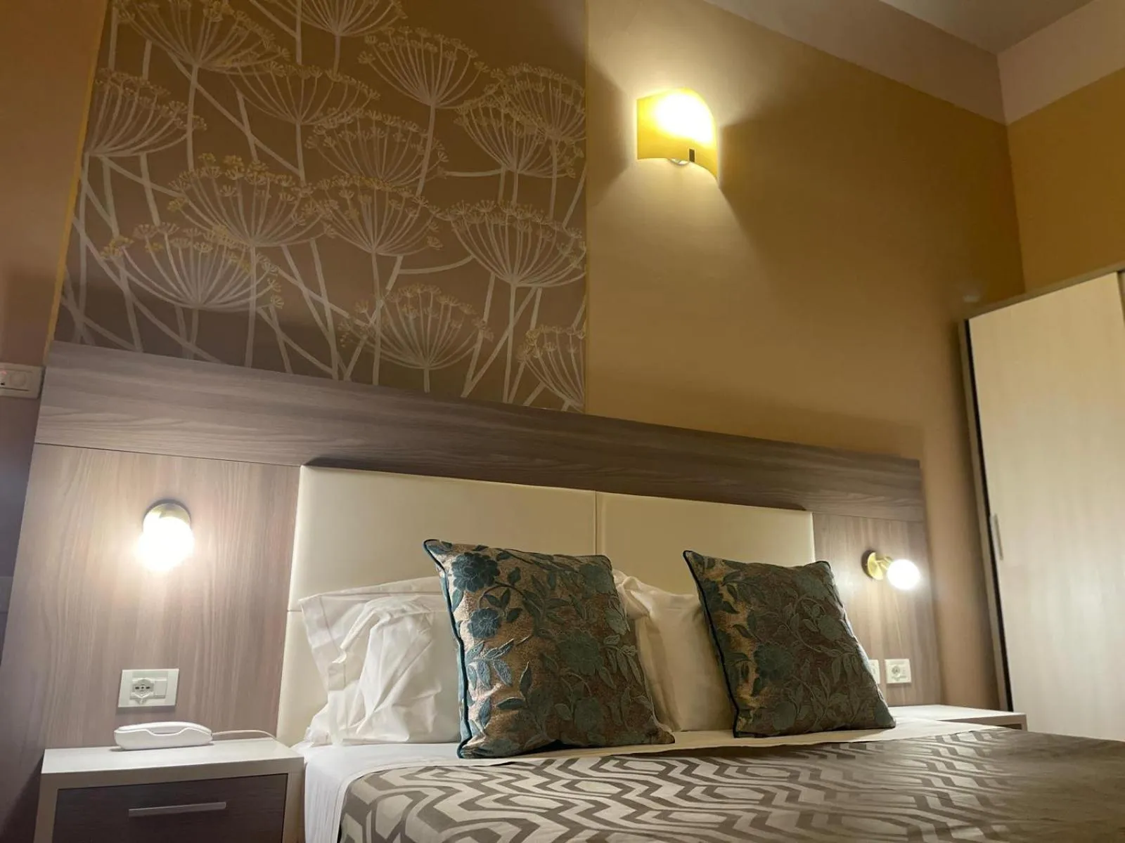 Bed in Hotel Maxim Axial