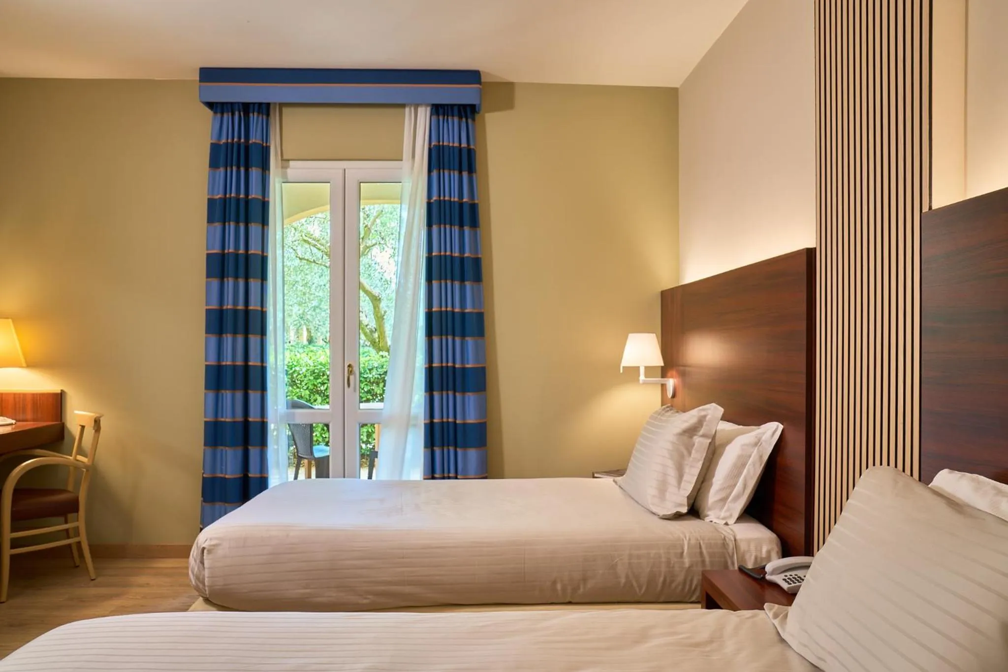 Bed in Delfina Palace Hotel