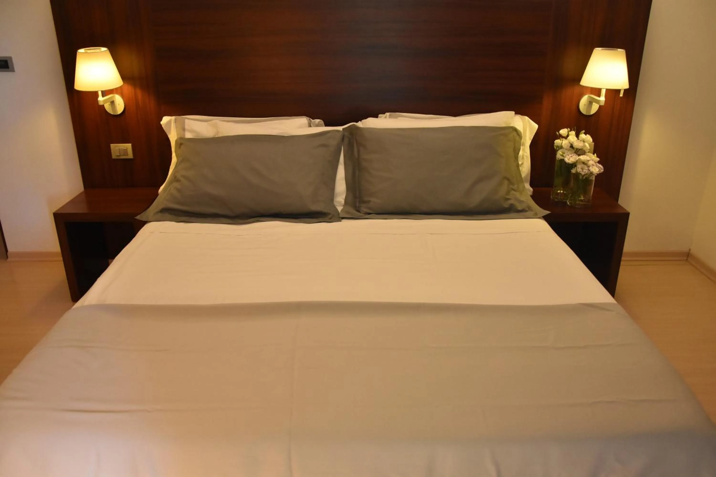 Bed in Delfina Palace Hotel