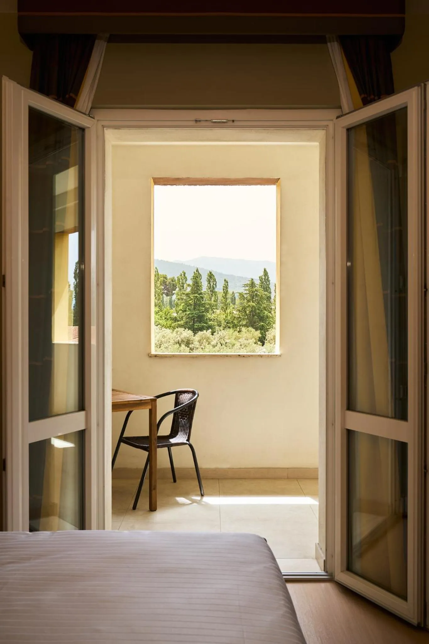 Bed in Delfina Palace Hotel